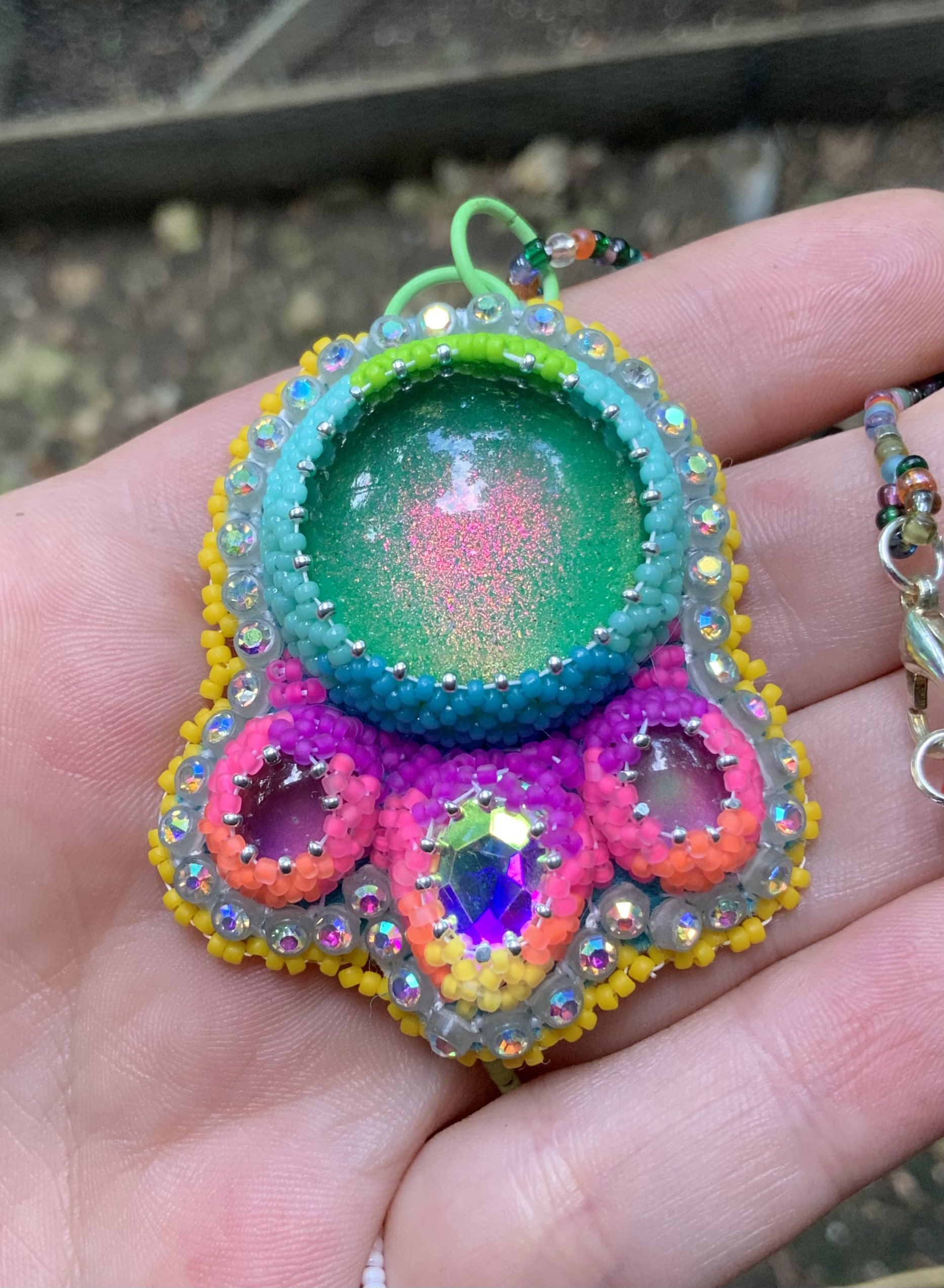 Pink fire beaded pendant