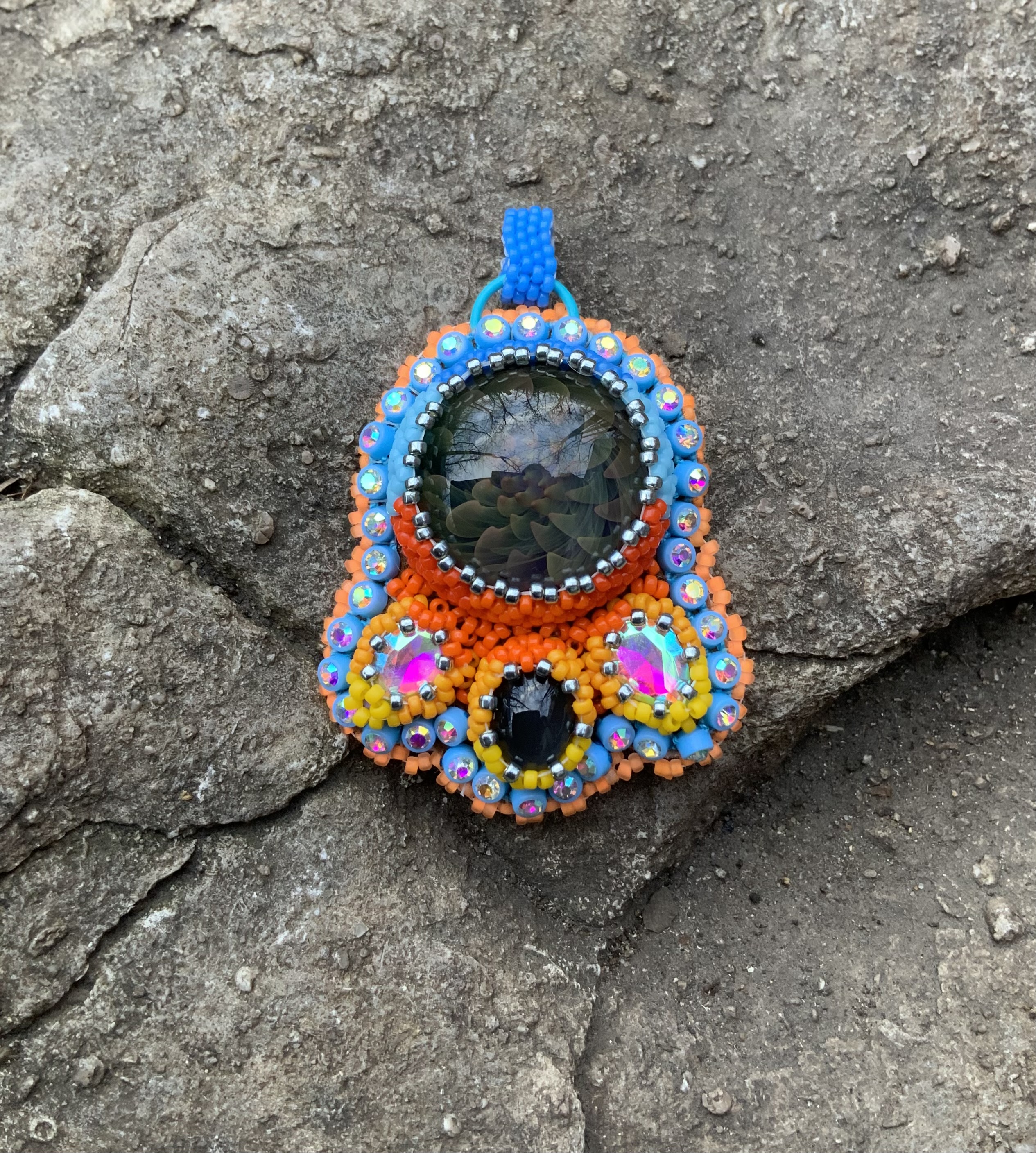 Frozen flame beaded pendant