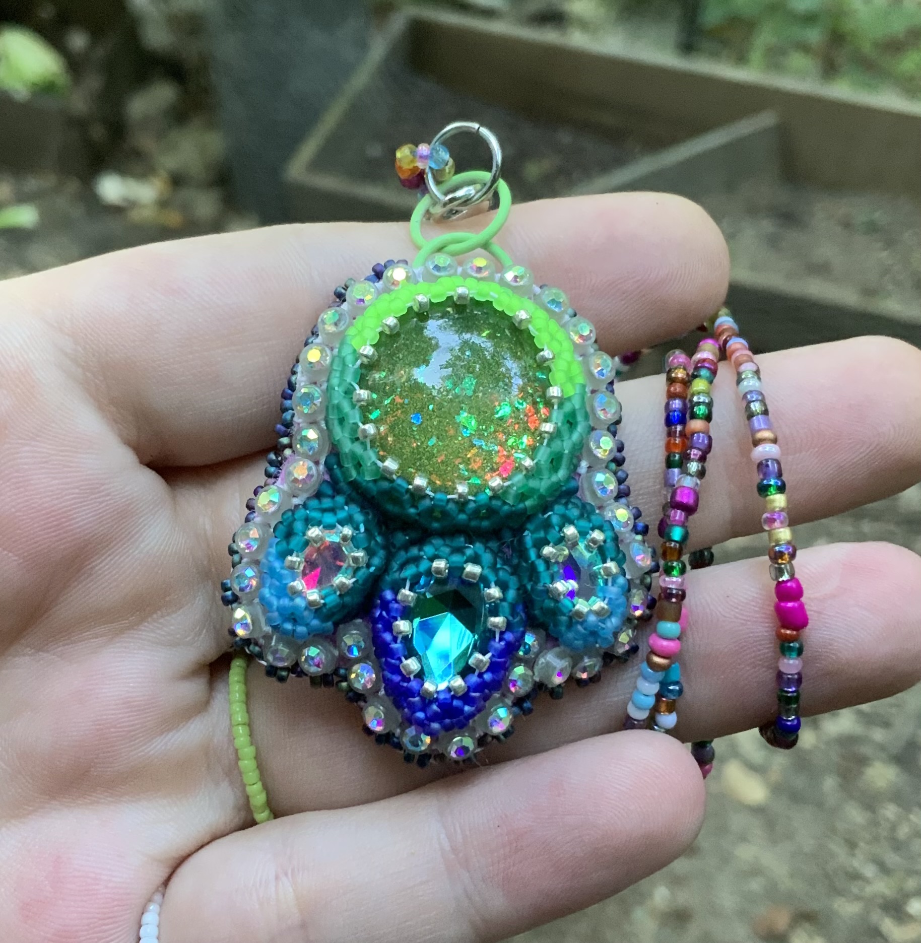 Green heat beaded pendant