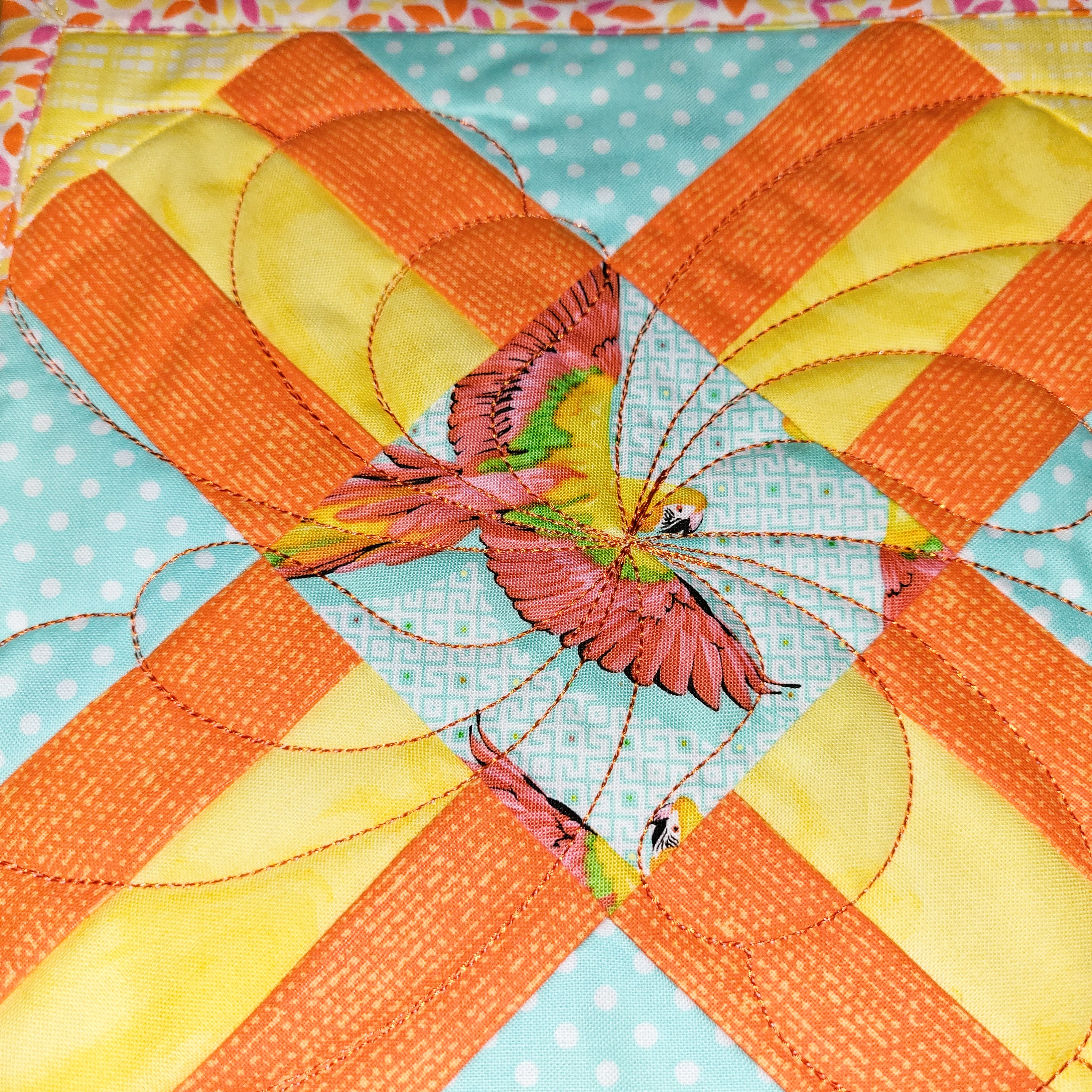 Macaw Mug Rug using Tula Pink fabric Handmade Aqua Yellow Orange Pieced Quilted Embroidered Let your Imagination Soar