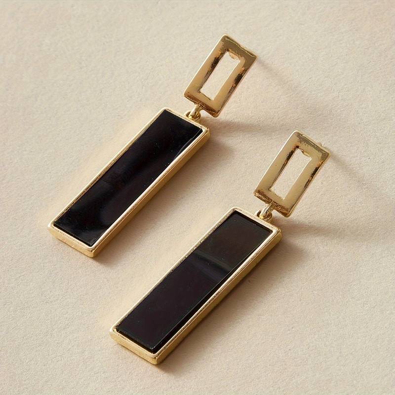 Black square-shaped dangle earrings