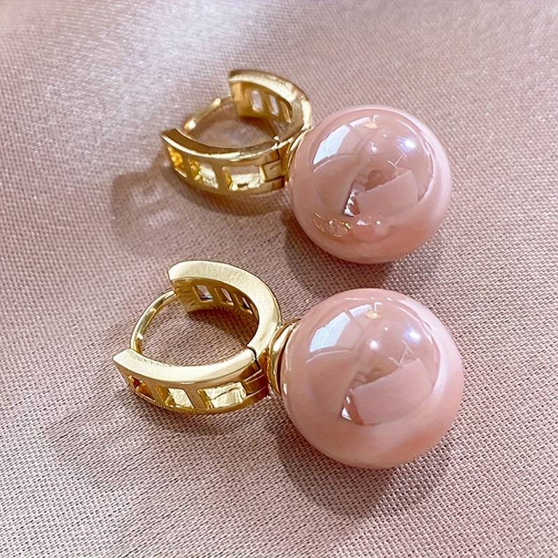  Pretty Hoop Earrings Designed With A Beautiful Pink Imitation Pearl.