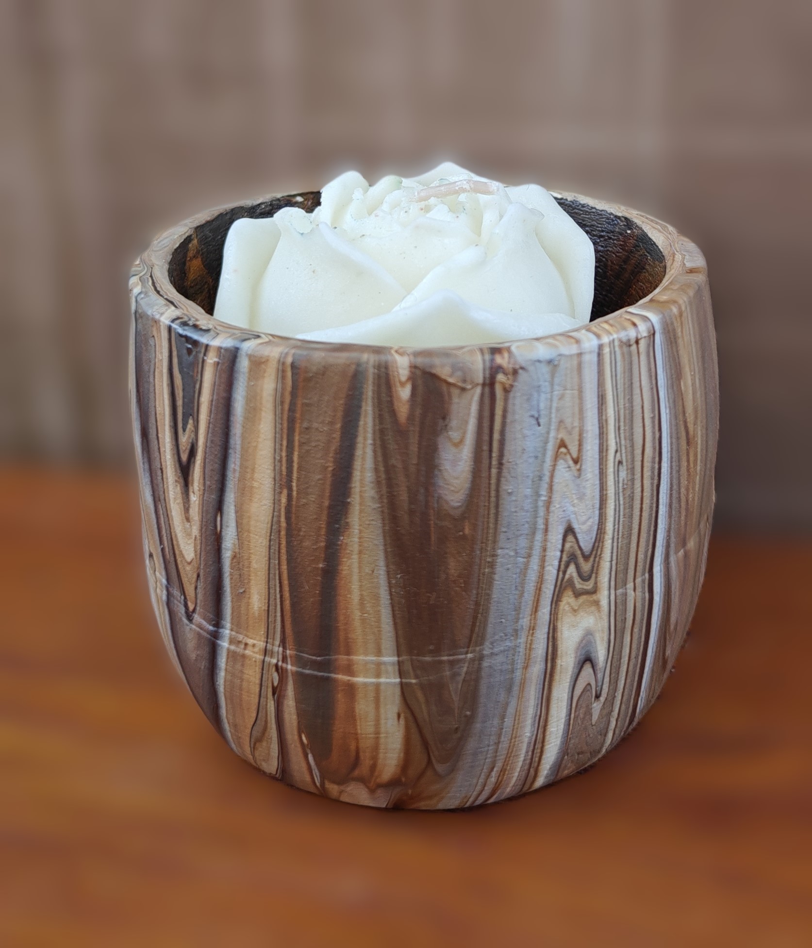 Woodgrain patterned pot with decorative flower