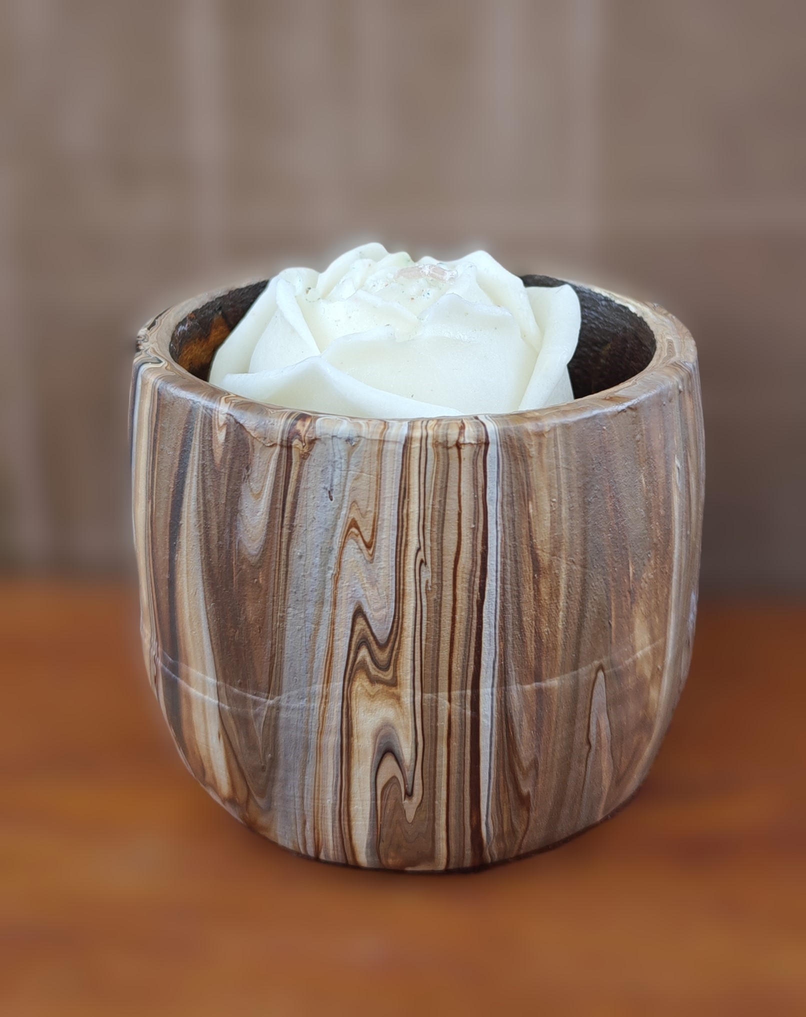 Woodgrain patterned pot with decorative flower