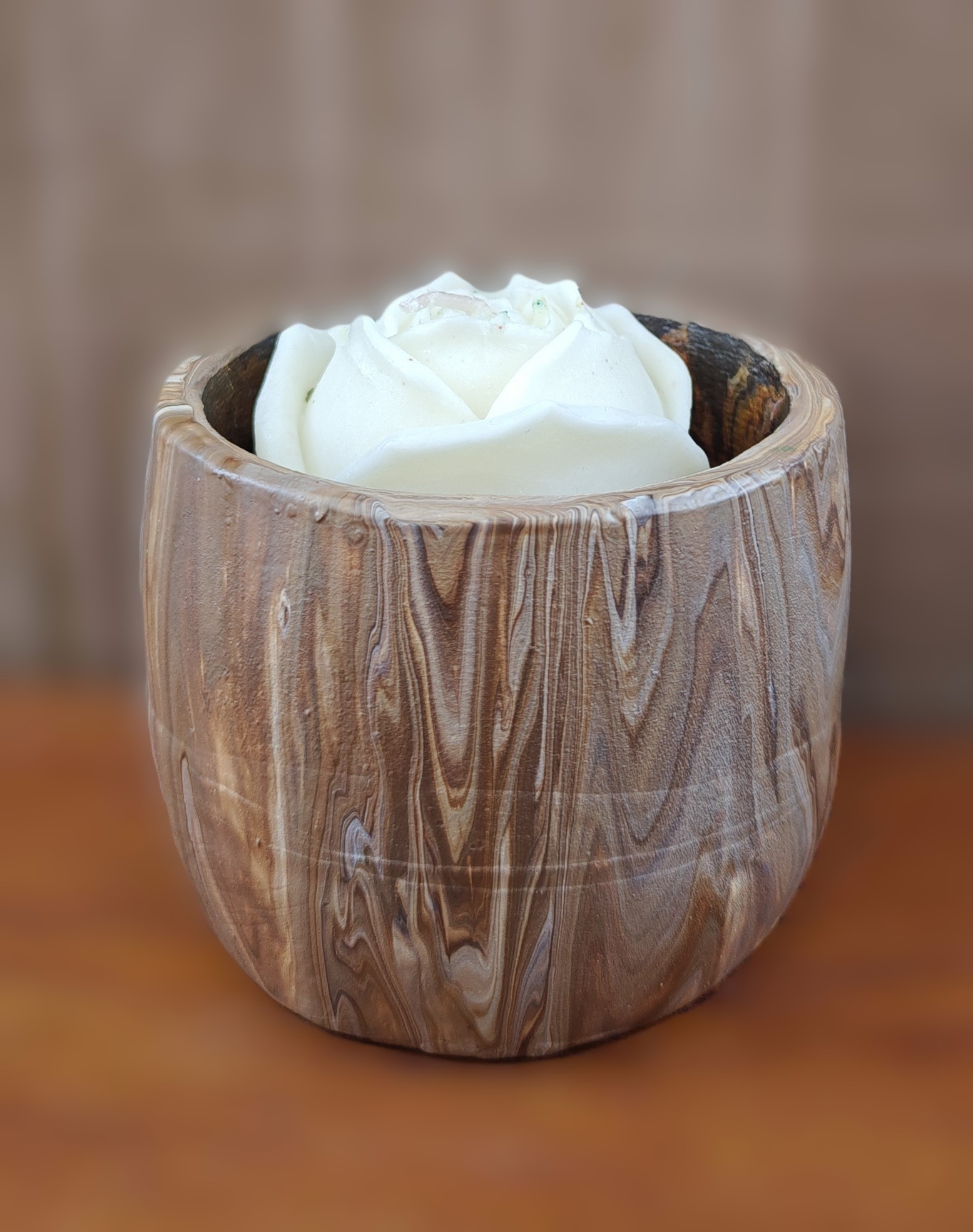 Woodgrain patterned pot with decorative flower