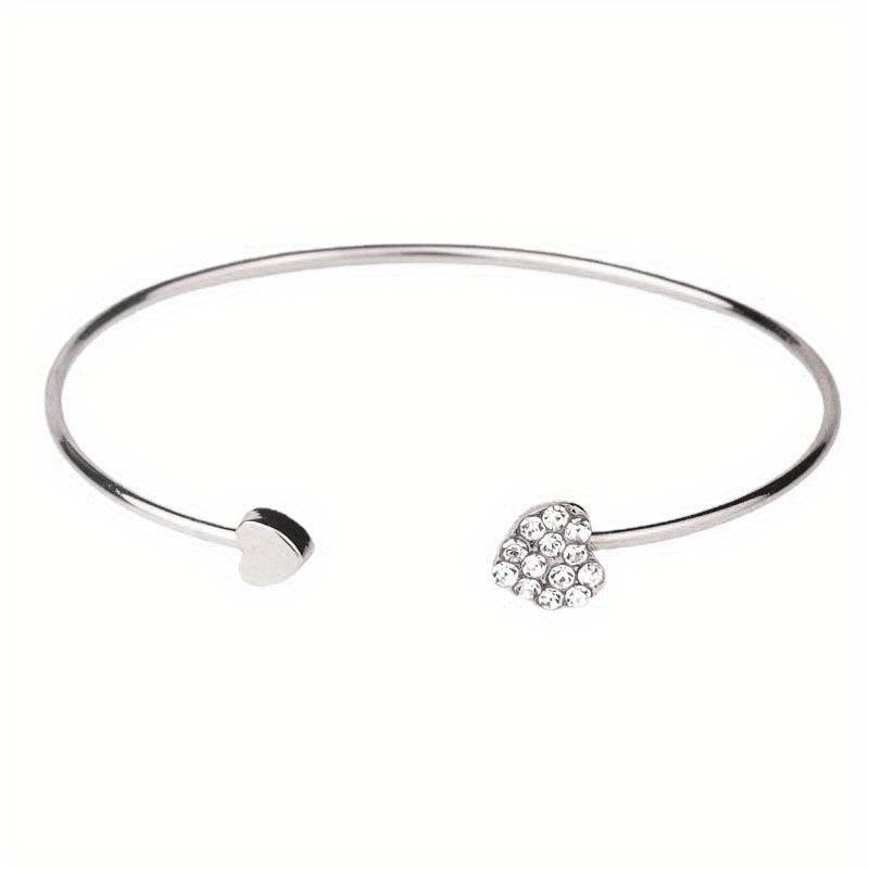 Silver bracelet with heart charm
