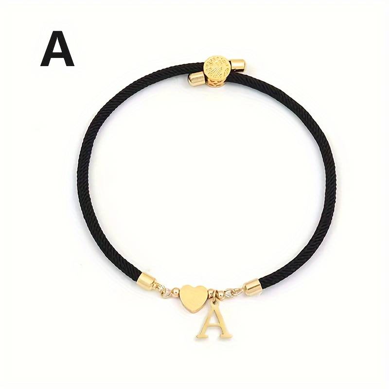 Black rope bracelet with gold heart and initial a charm