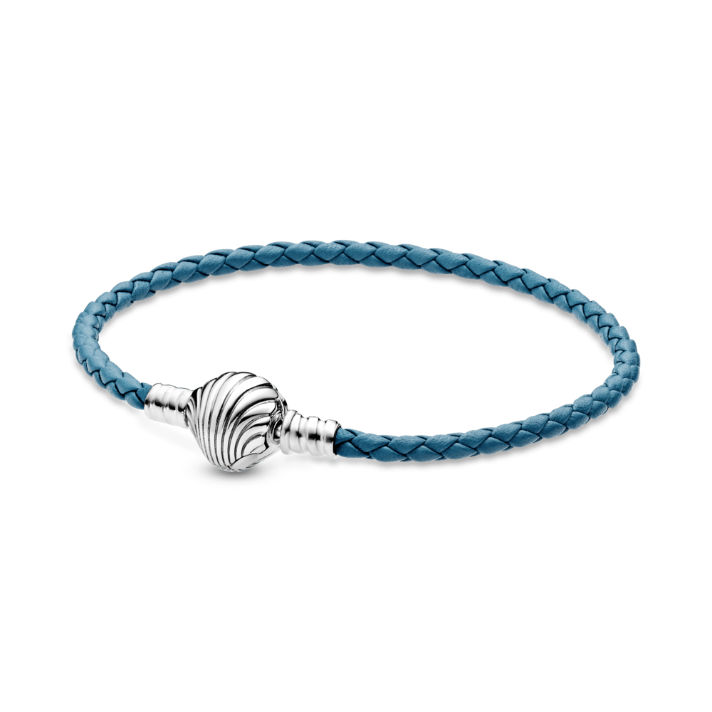 Pulsera en cuero trenzado turquesa con cierre de concha 