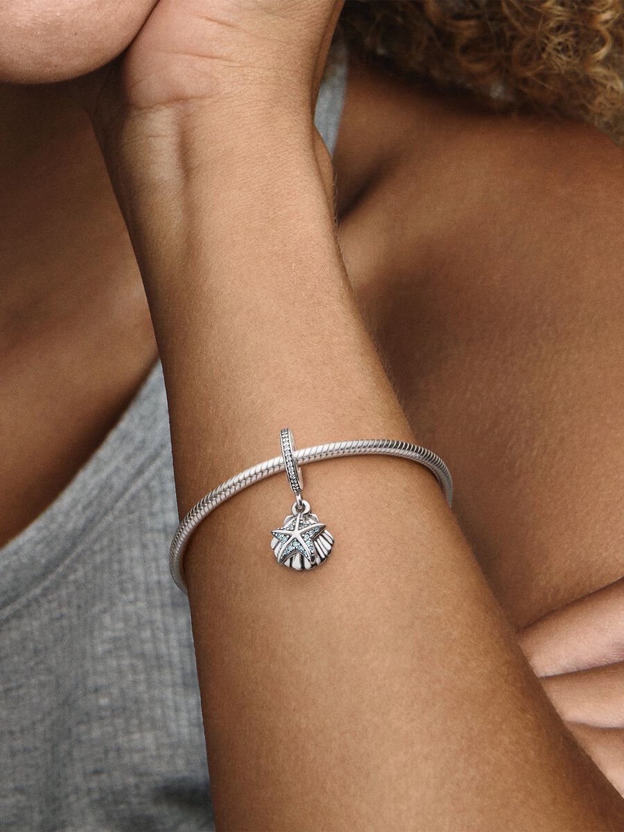 Charm colgante estrella de mar tropical y concha