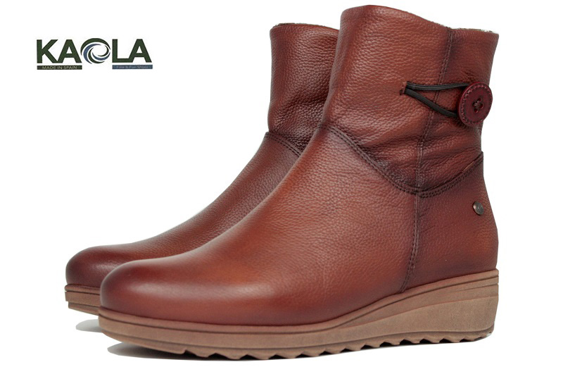 Botines de cuero con cremallera al lado