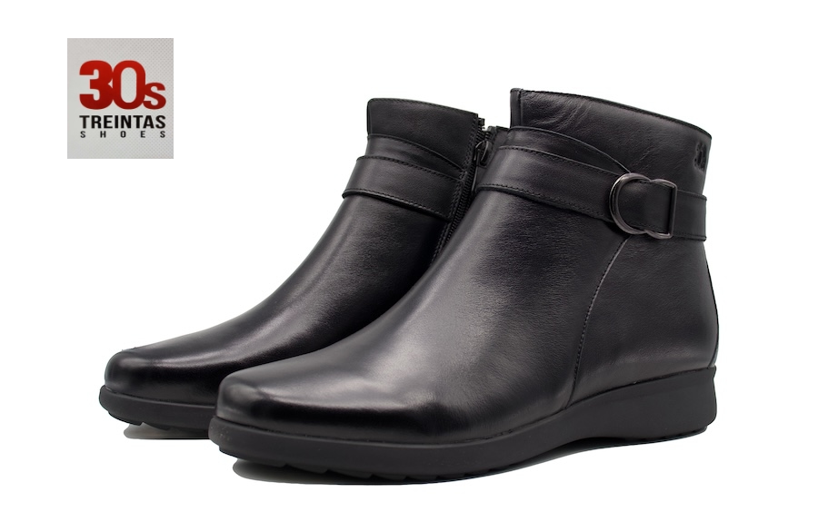 Botines planos de piel negra