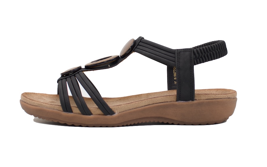Sandalias planas negras con adorno de madera en el empeine