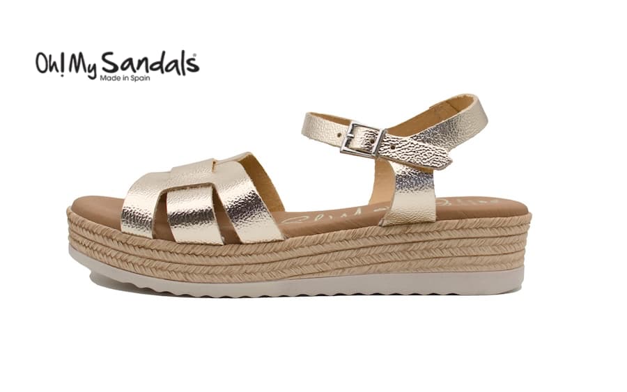 Sandalias color champán de cuña media