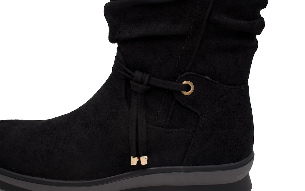 Botines de caña alta de antelina negra y piso plano 