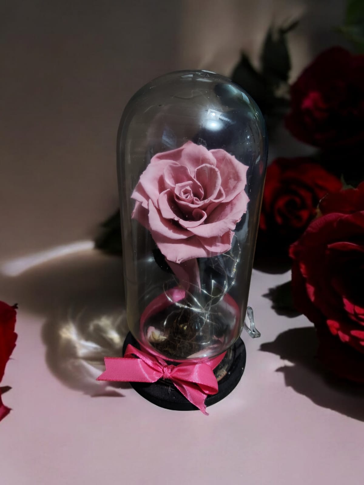Flor eterna natural palo de rosa luces calidas
