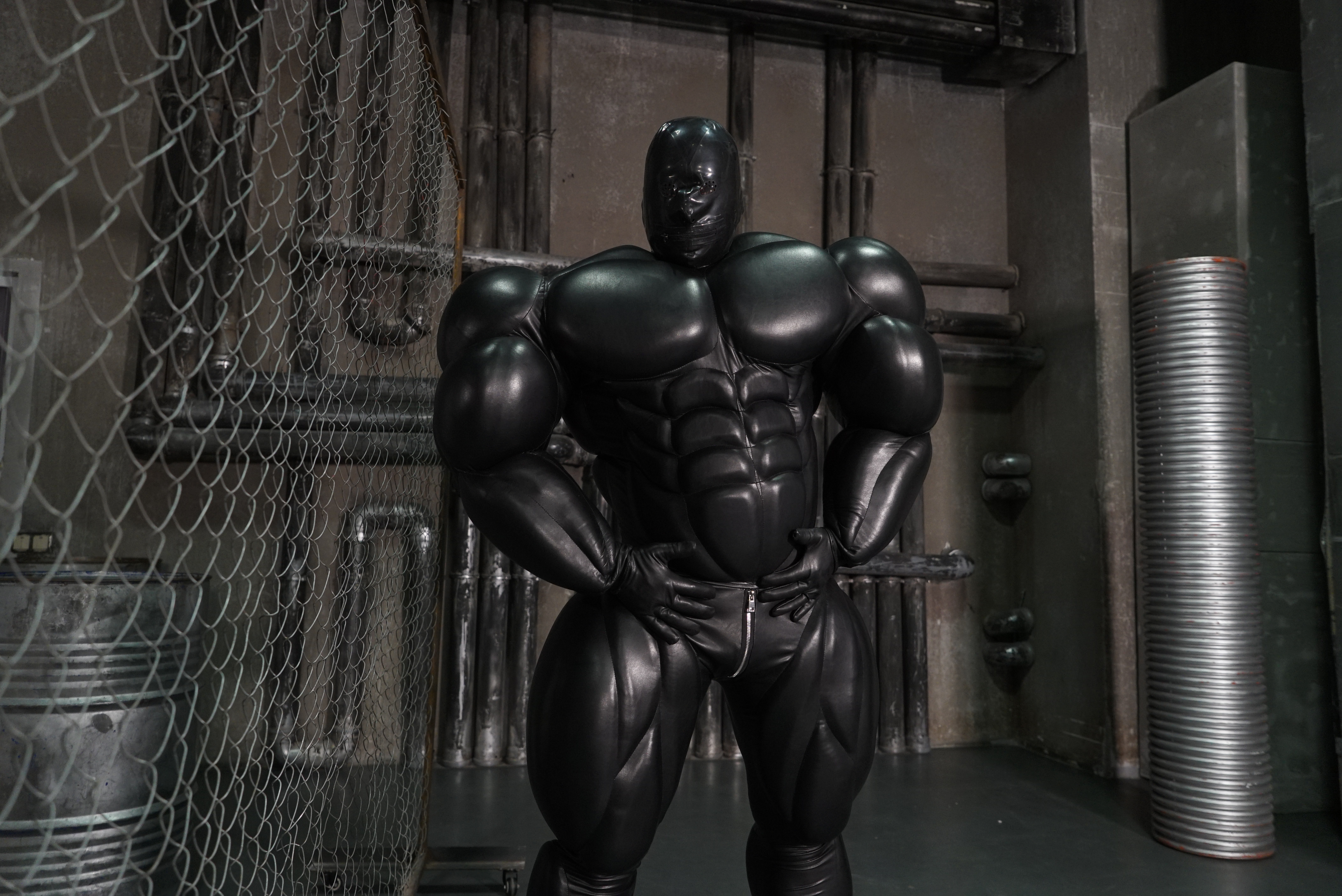 Giant muscle suit / black faux leather 