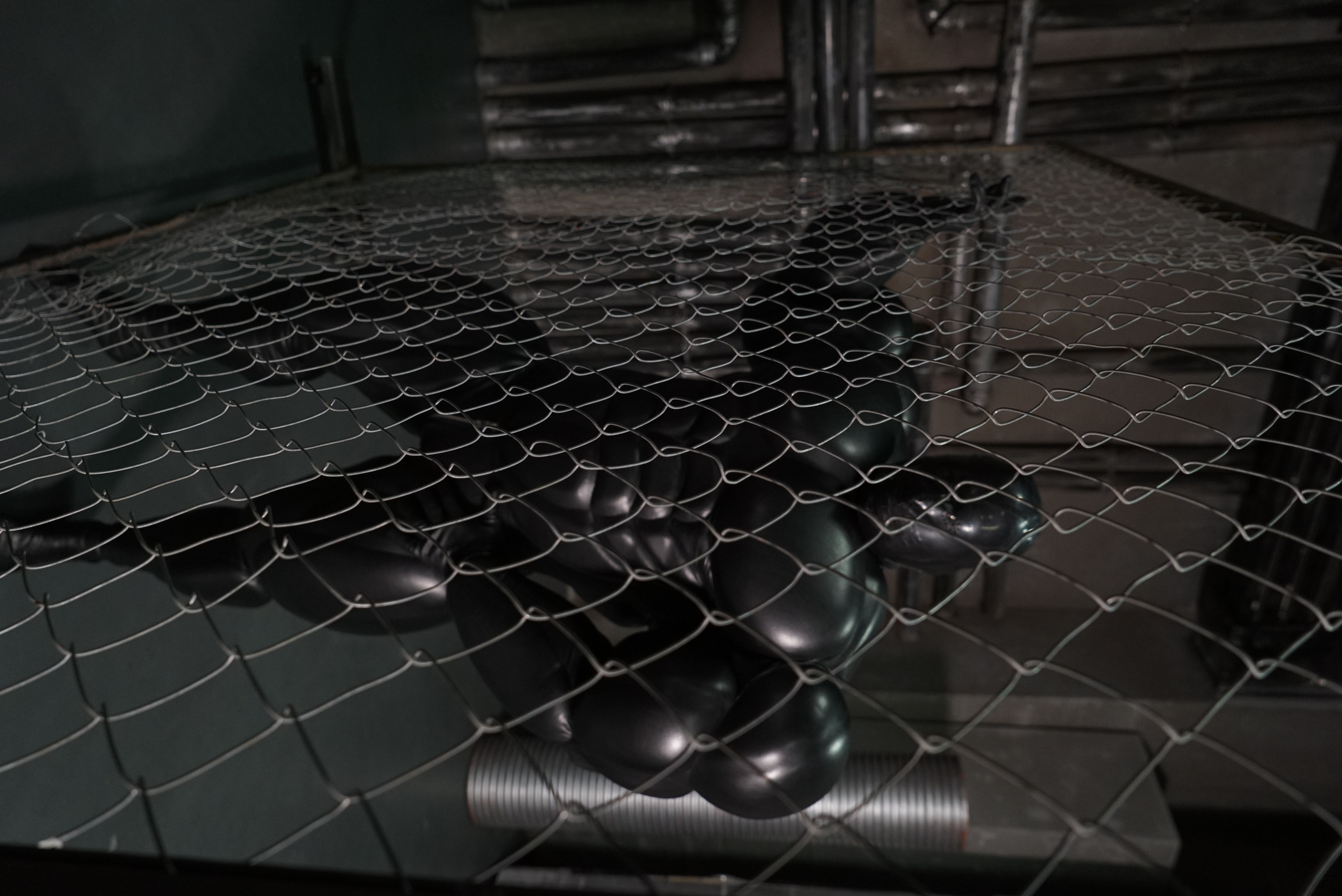 Giant muscle suit / black faux leather 