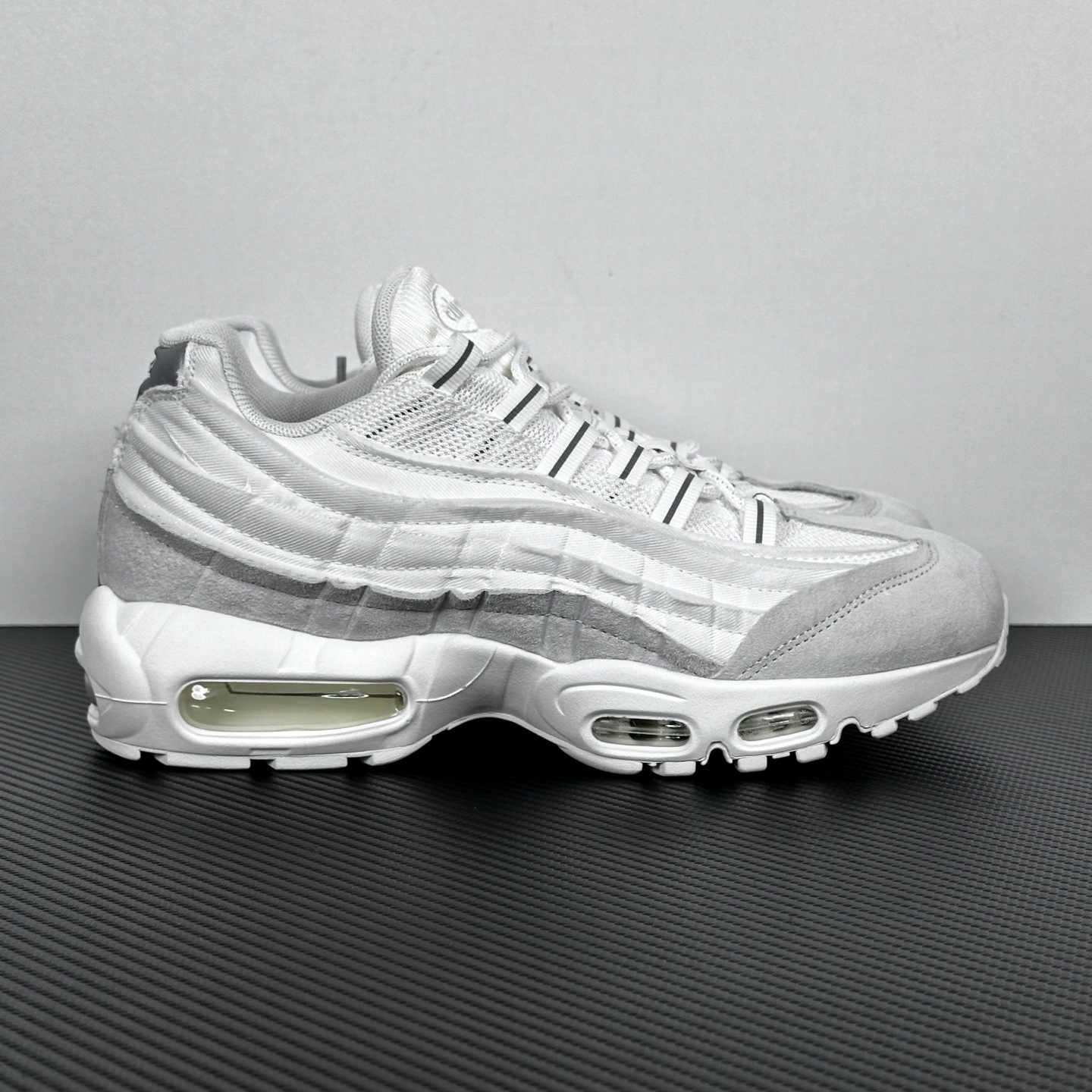 AM95 CDG White