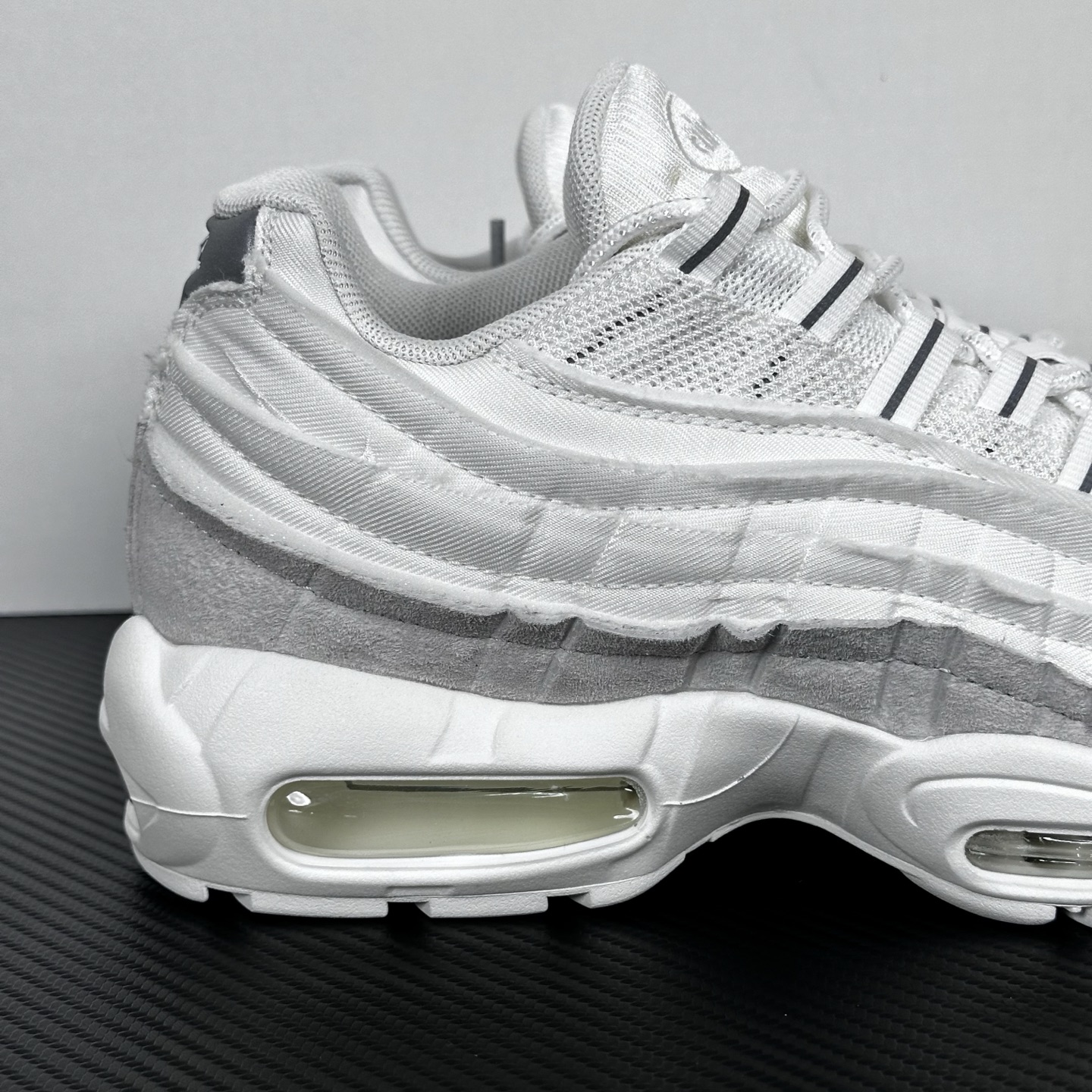 AM95 CDG White