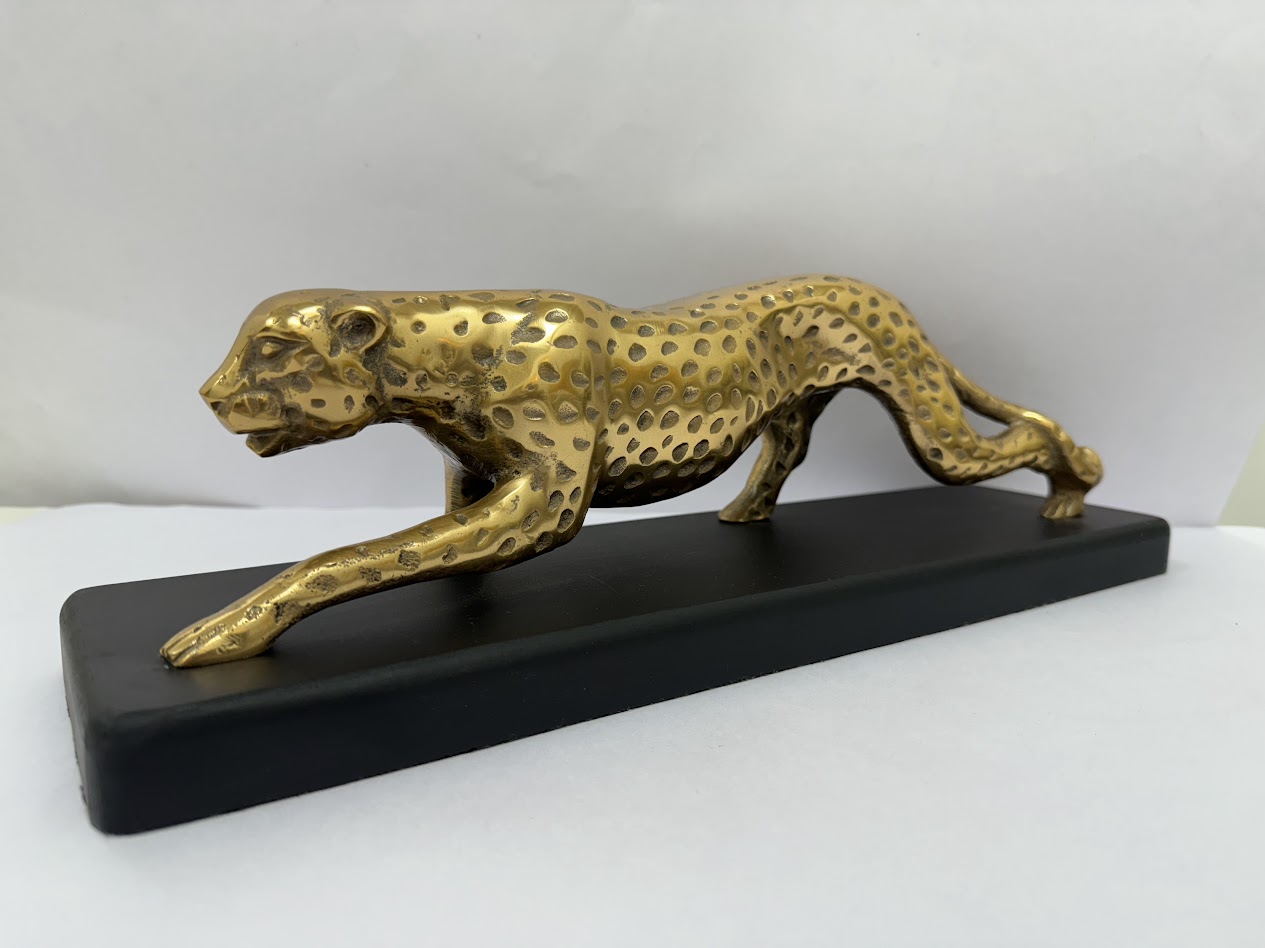 Stealth in Motion – Metallic Panther Sculptures