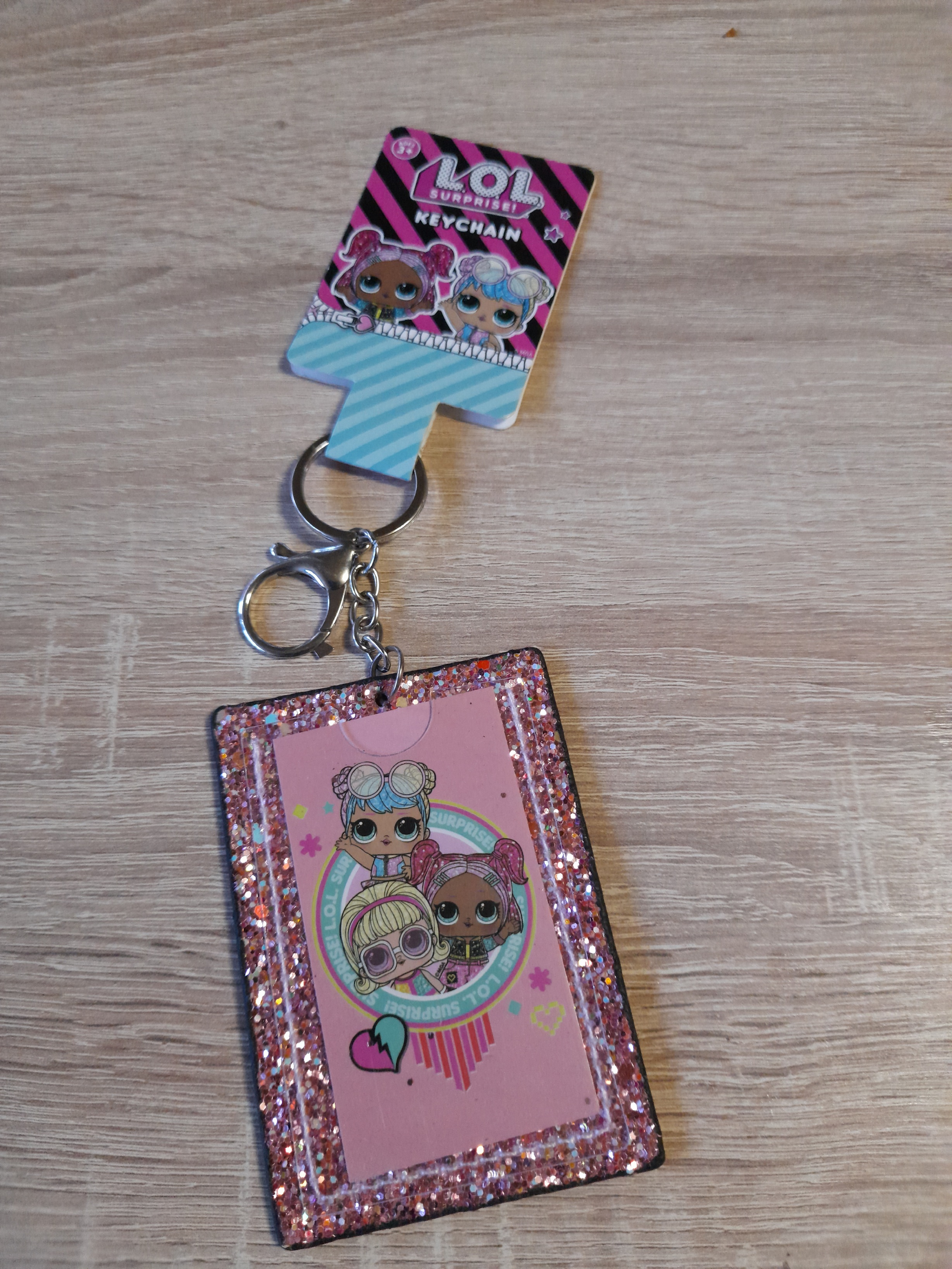 LOL SURPRISE Blizgantis raktas! SU FOTO KIŠENE 7x 10cm