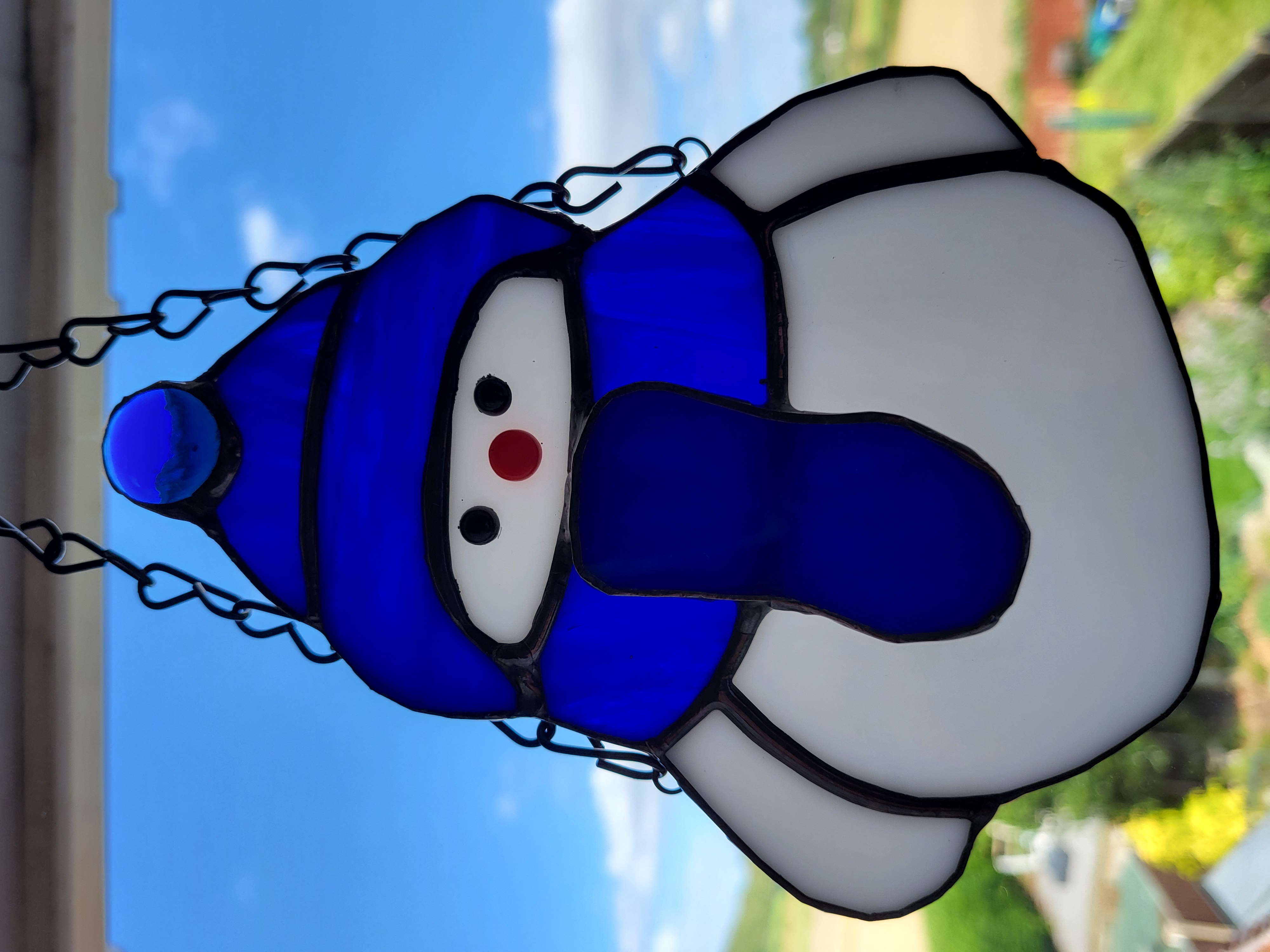 Snowmen with hats and scarves suncatchers