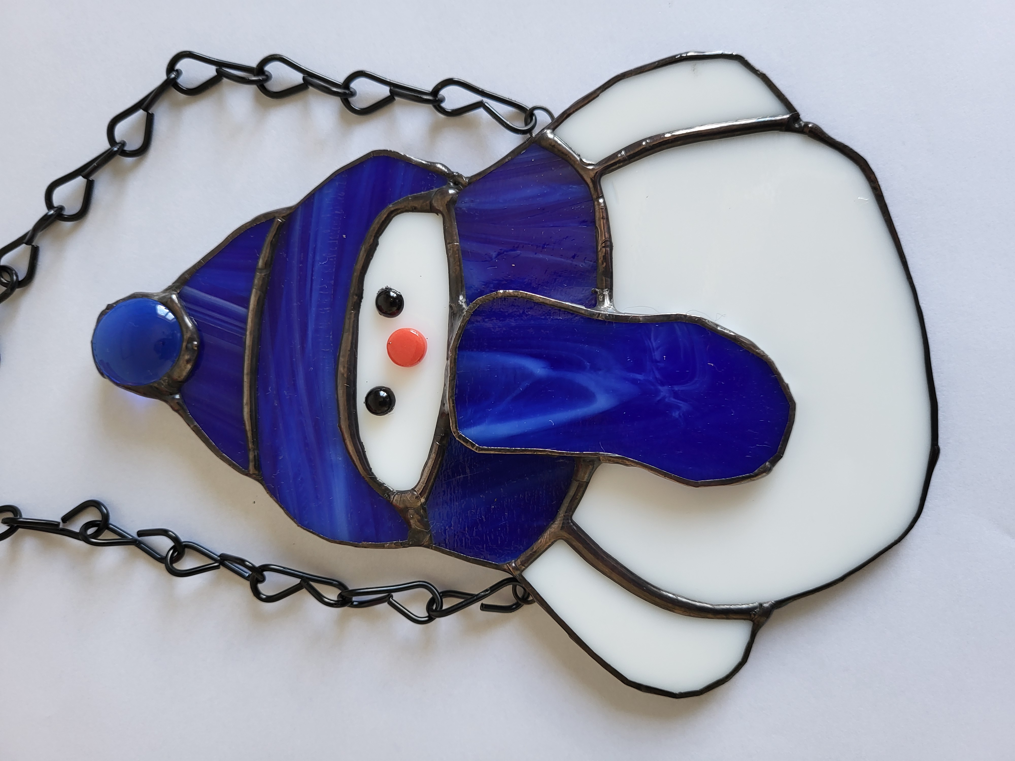 Snowmen with hats and scarves suncatchers
