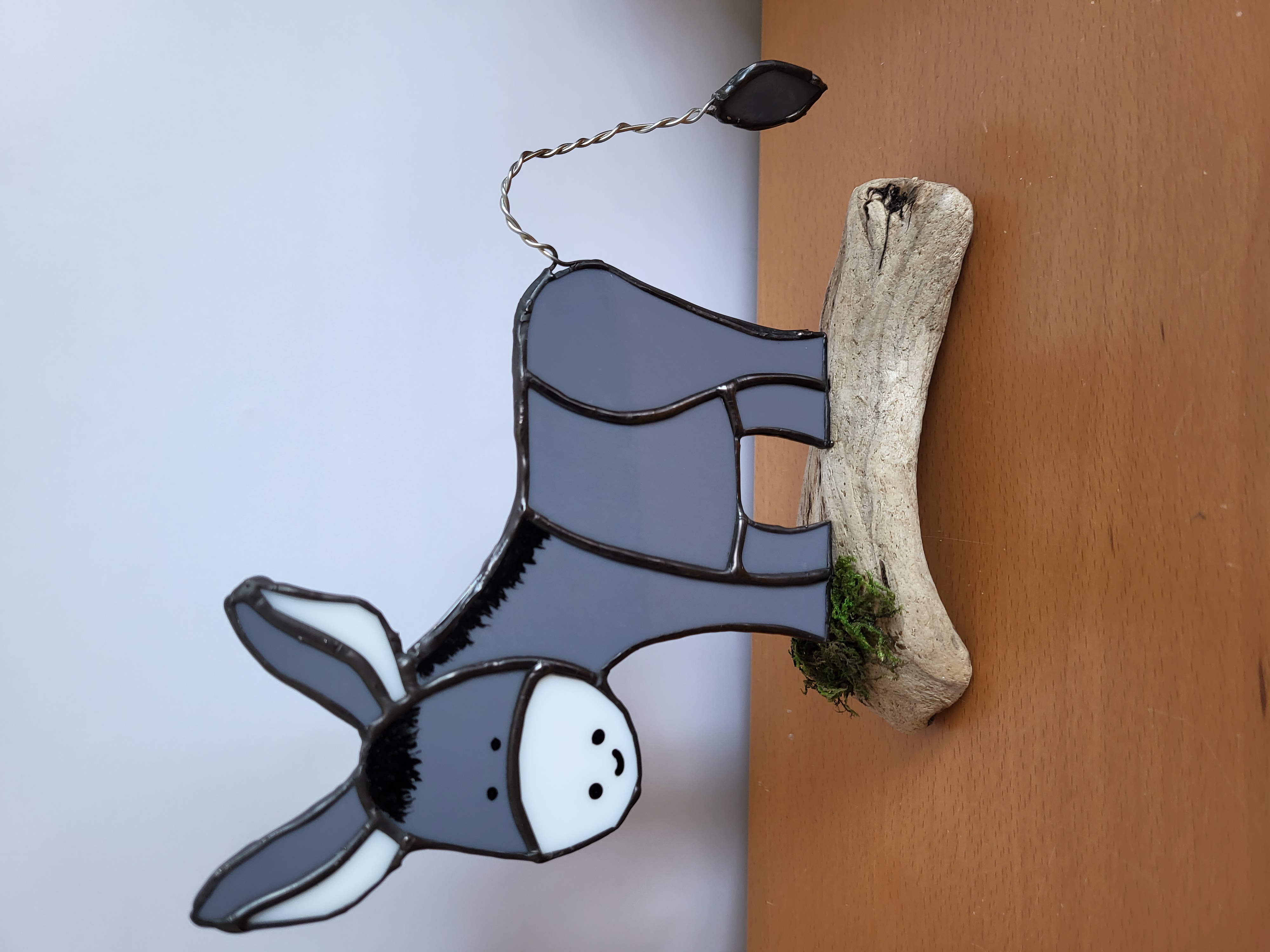 Donkeys on driftwood
