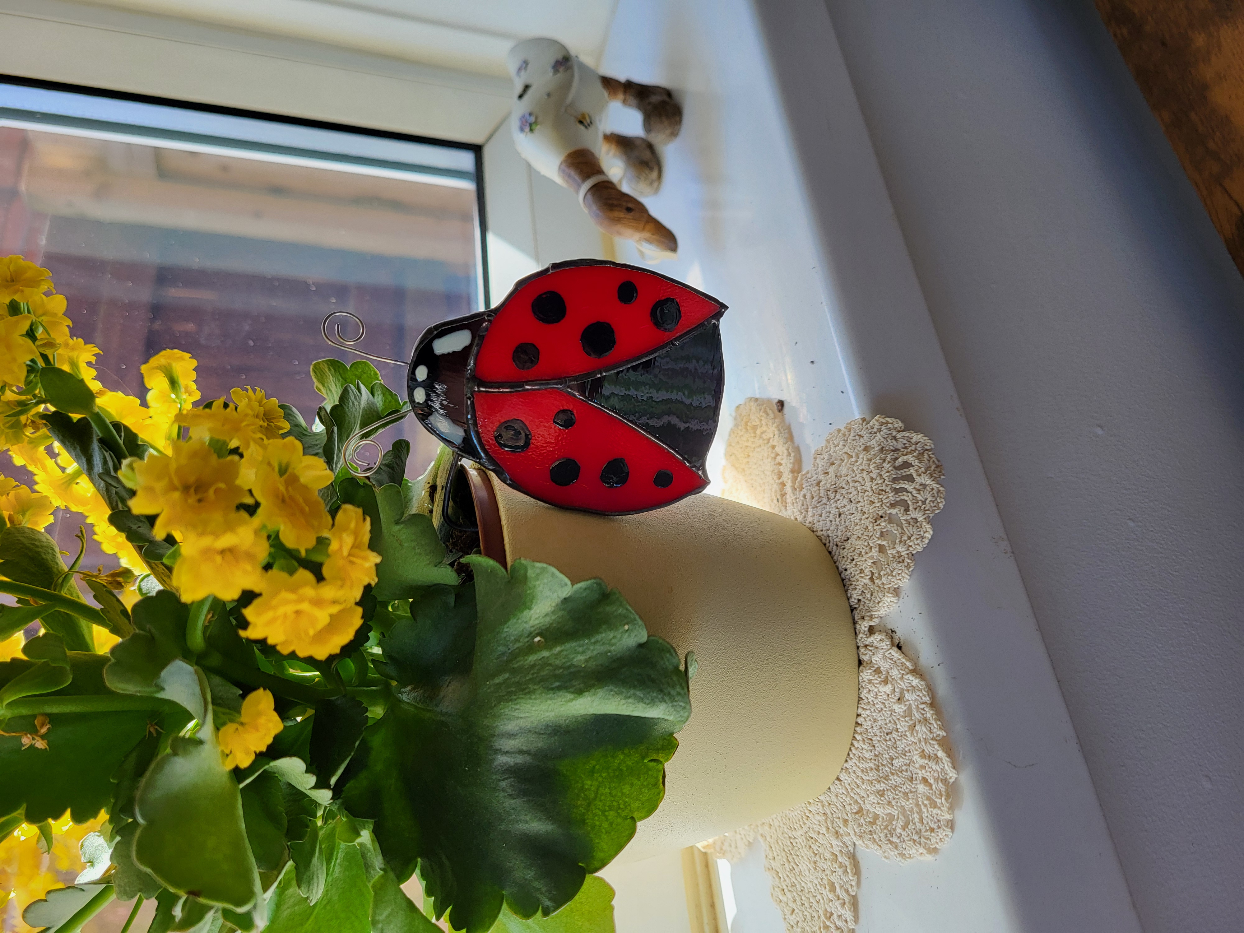 Ladybug plant pot hugger