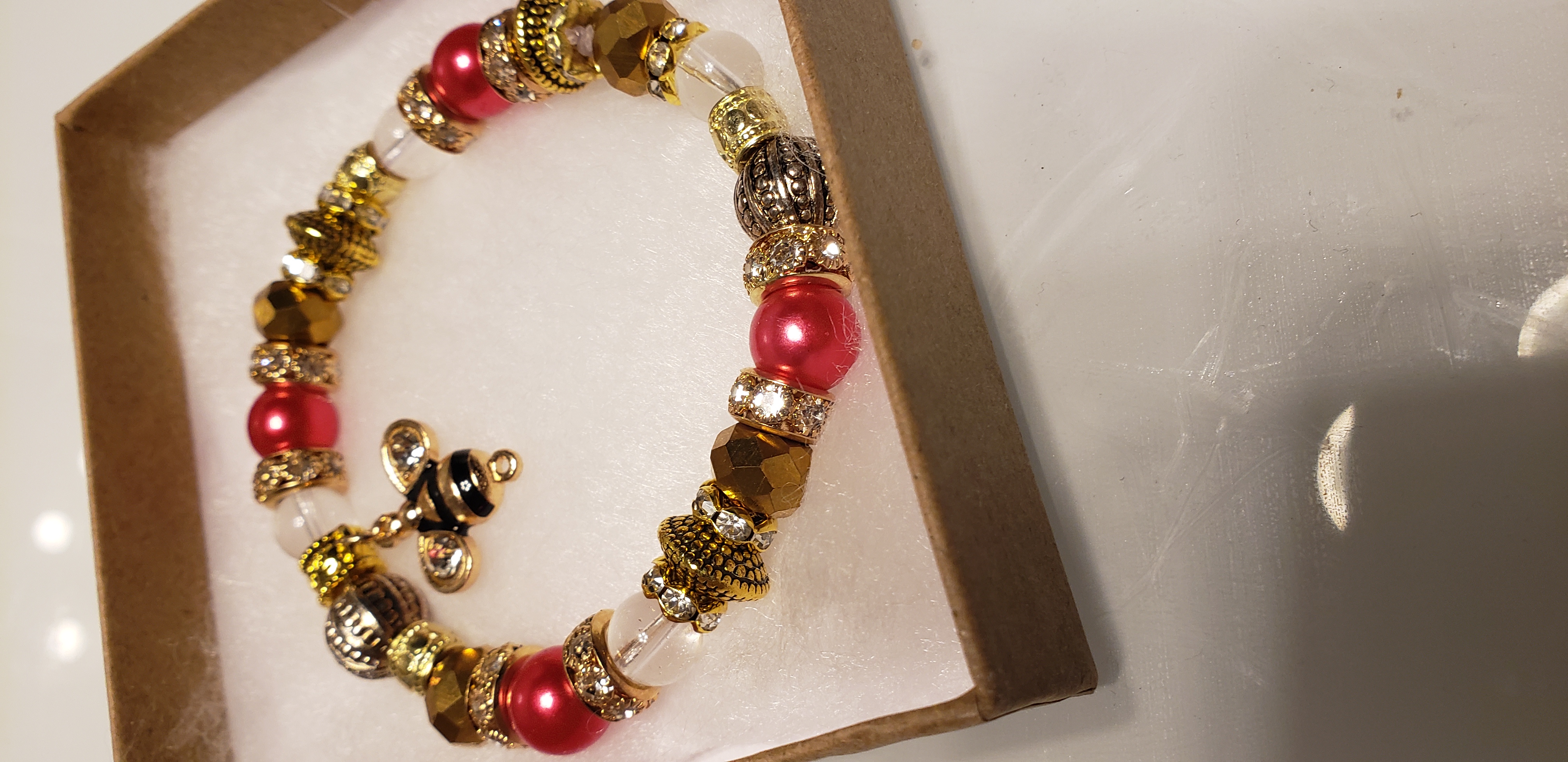 Red and Gold Beaded Bracelet with Bee Charm