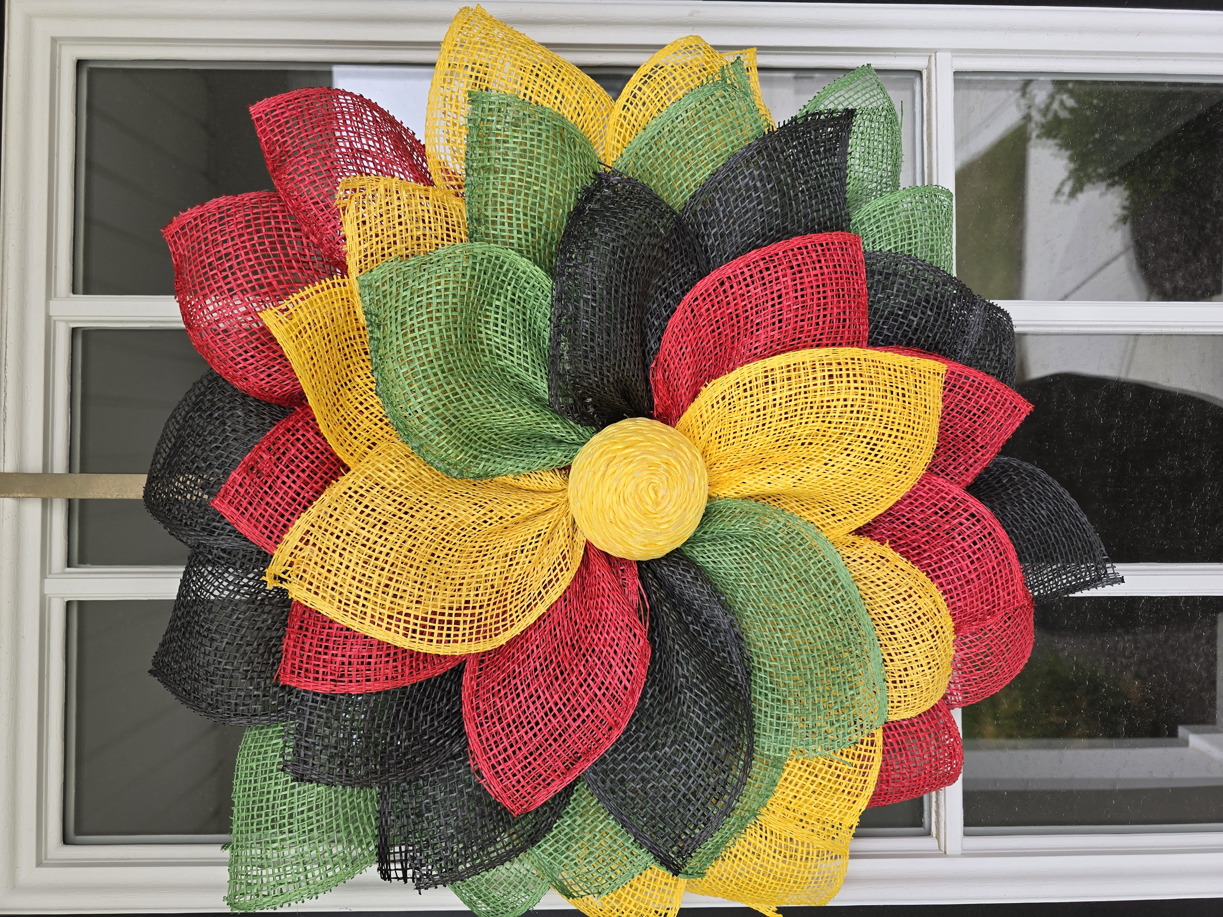 Red, Black, Yellow, and Green Floral Wreath