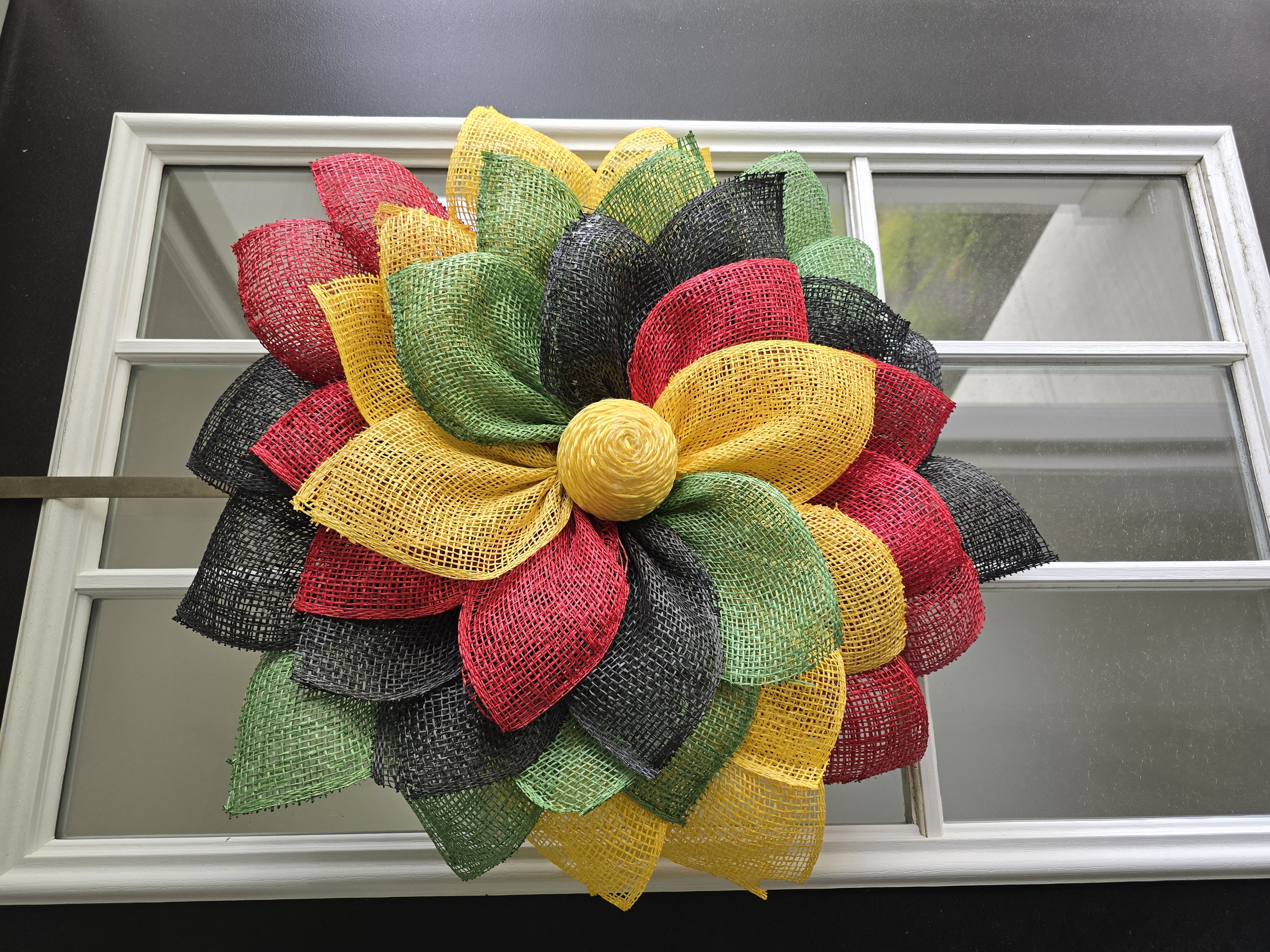 Red, Black, Yellow, and Green Floral Wreath