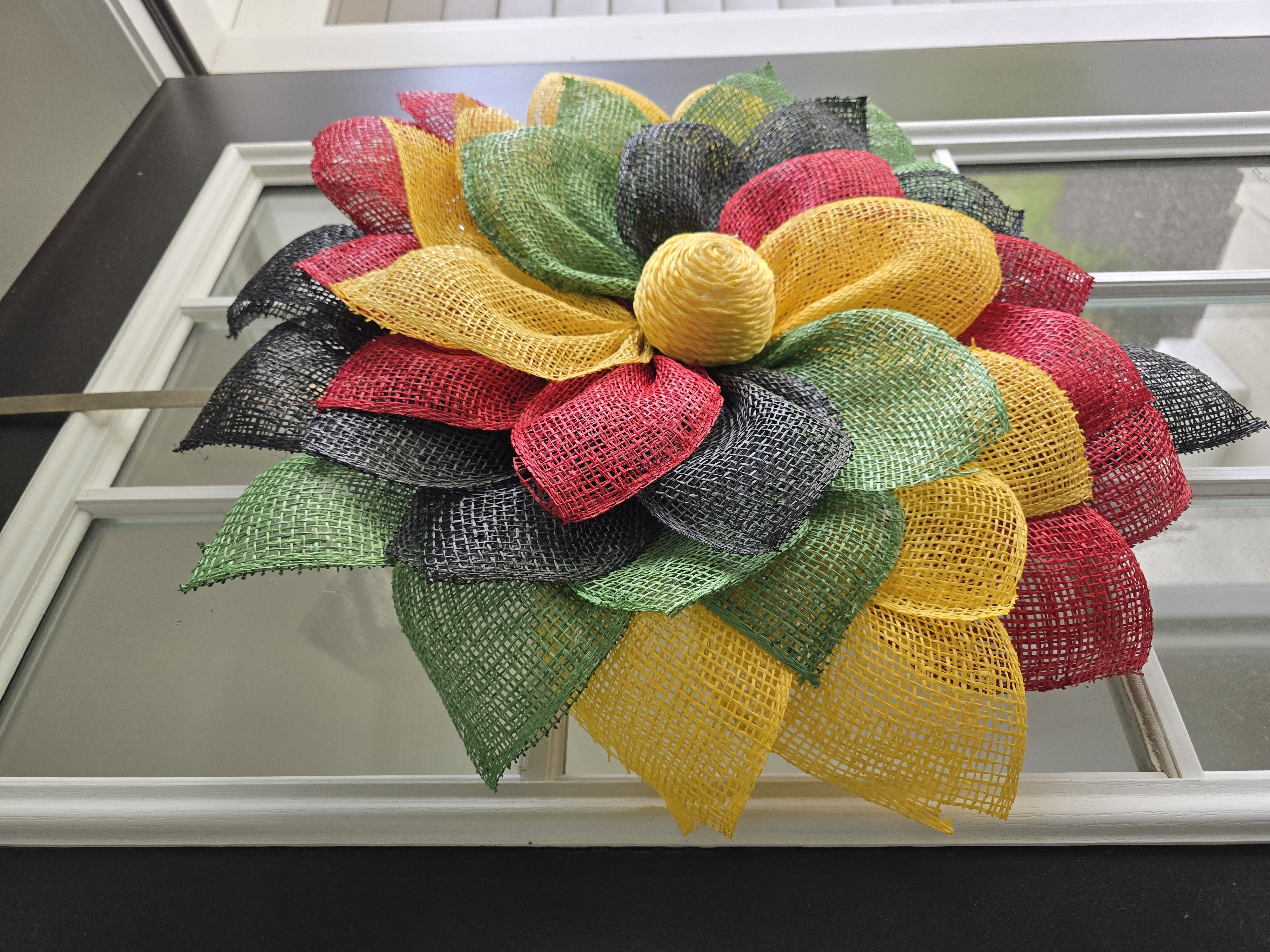 Red, Black, Yellow, and Green Floral Wreath