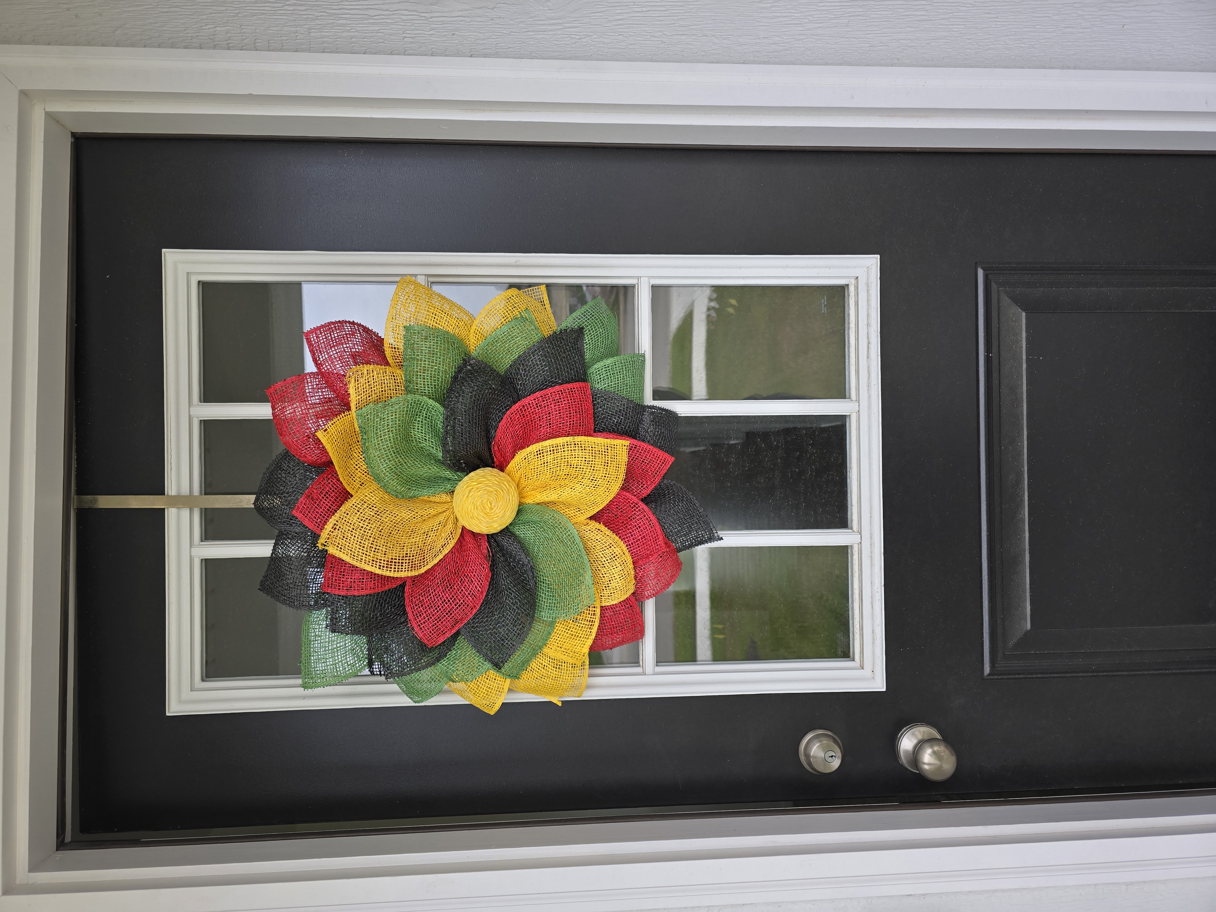 Red, Black, Yellow, and Green Floral Wreath