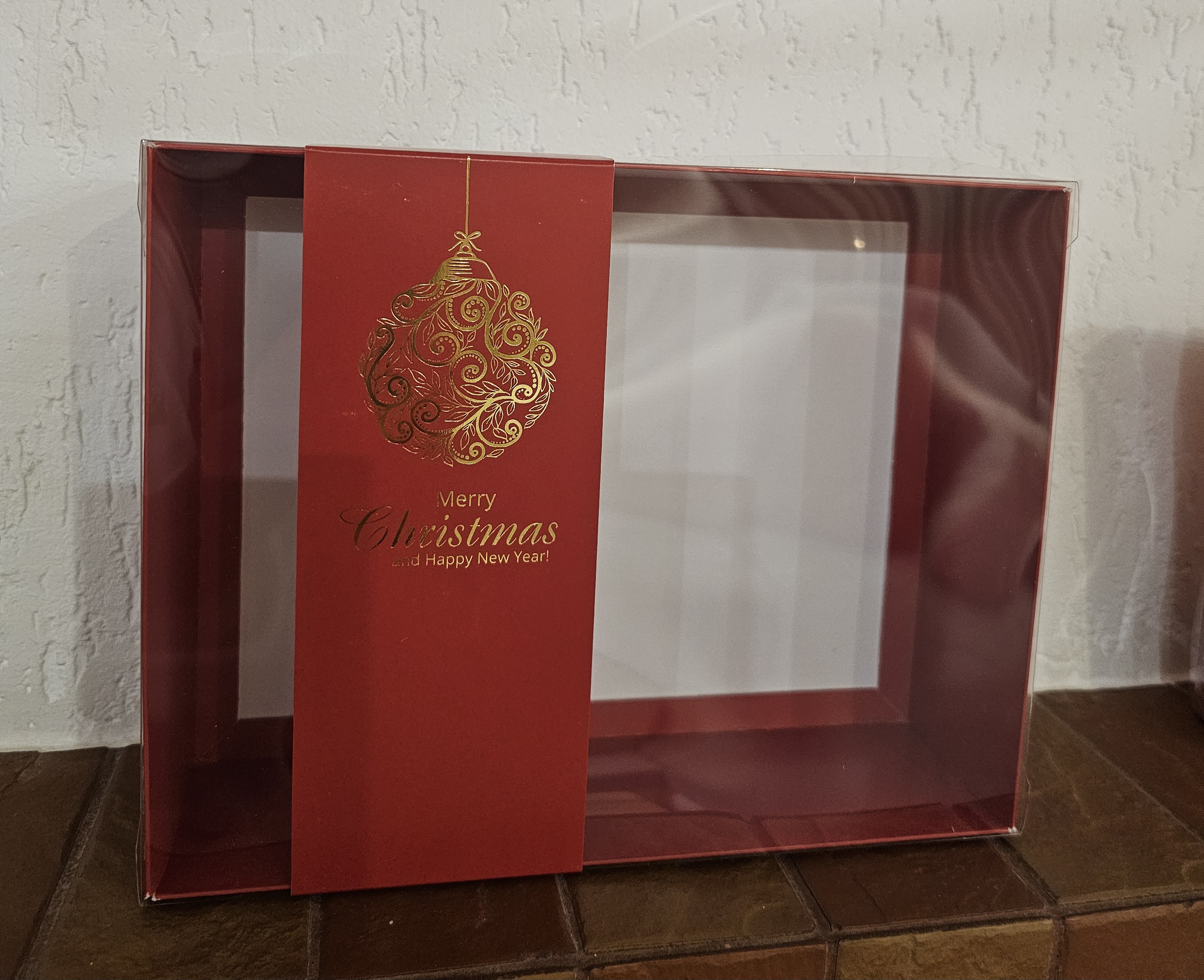 Dėžutė Kalėdinė su langeliu raudona