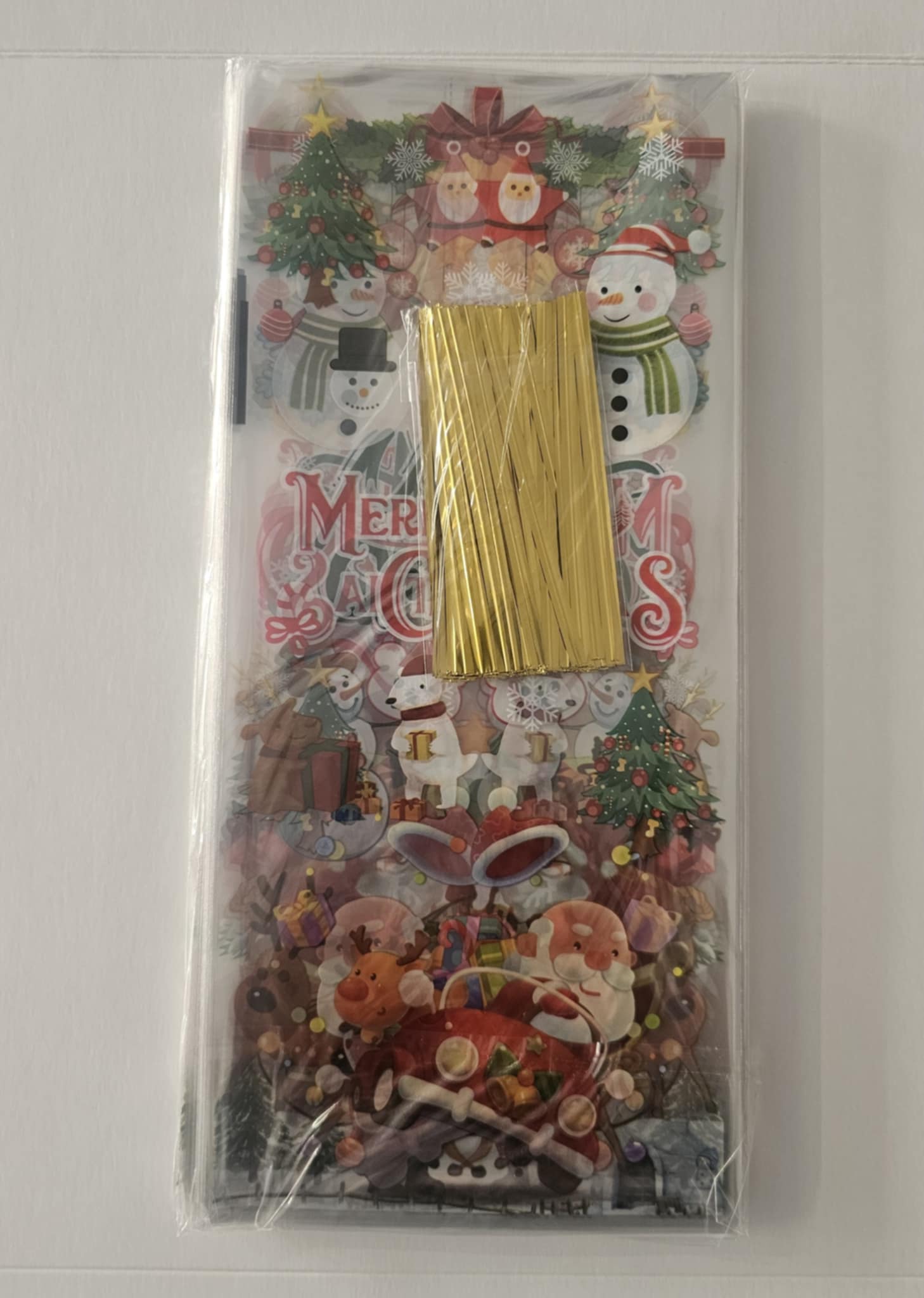 Maišeliai Merry Christmas  12,5x27,5cm (100vnt)