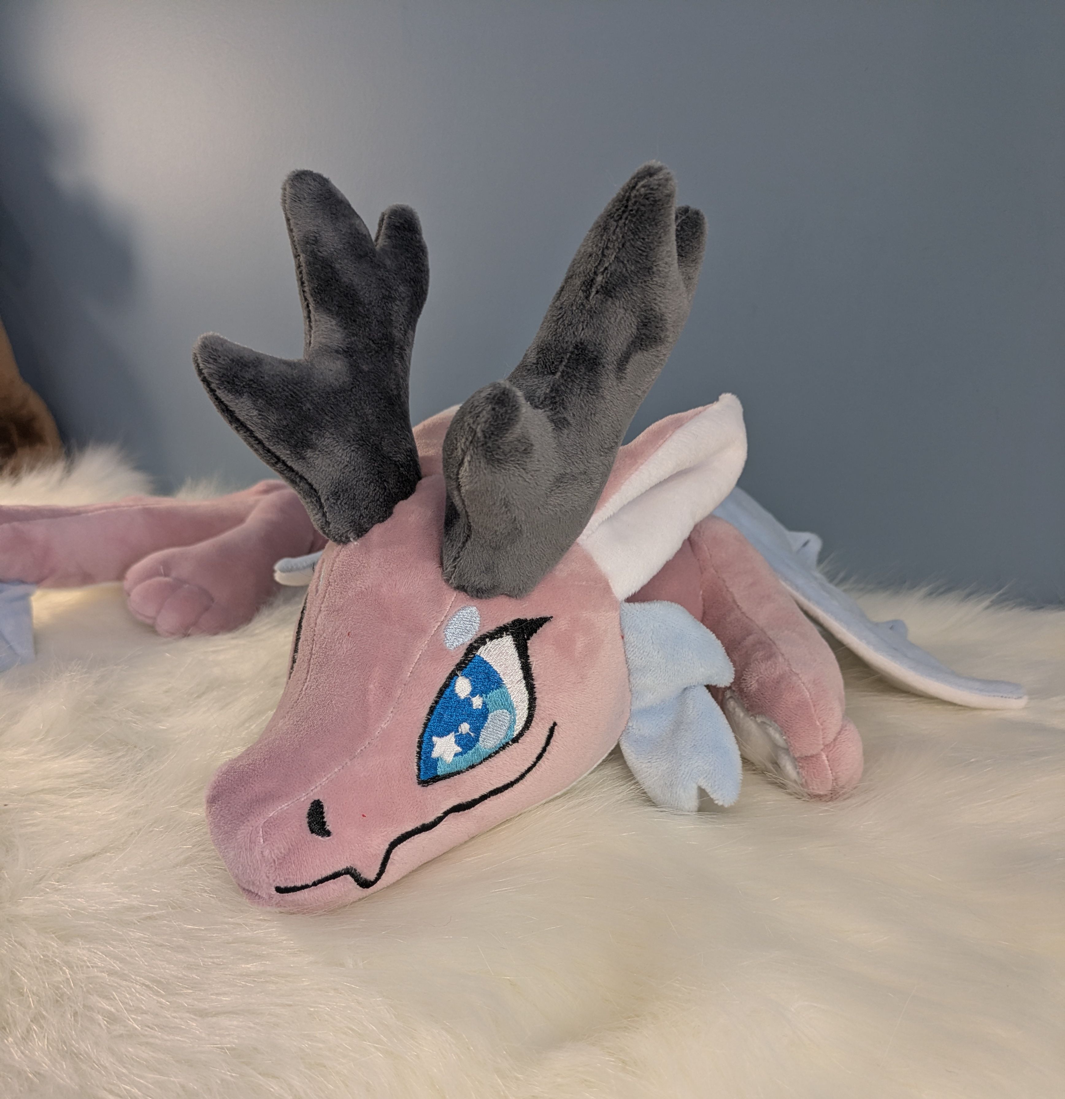 Peluche Tour de cou rose 