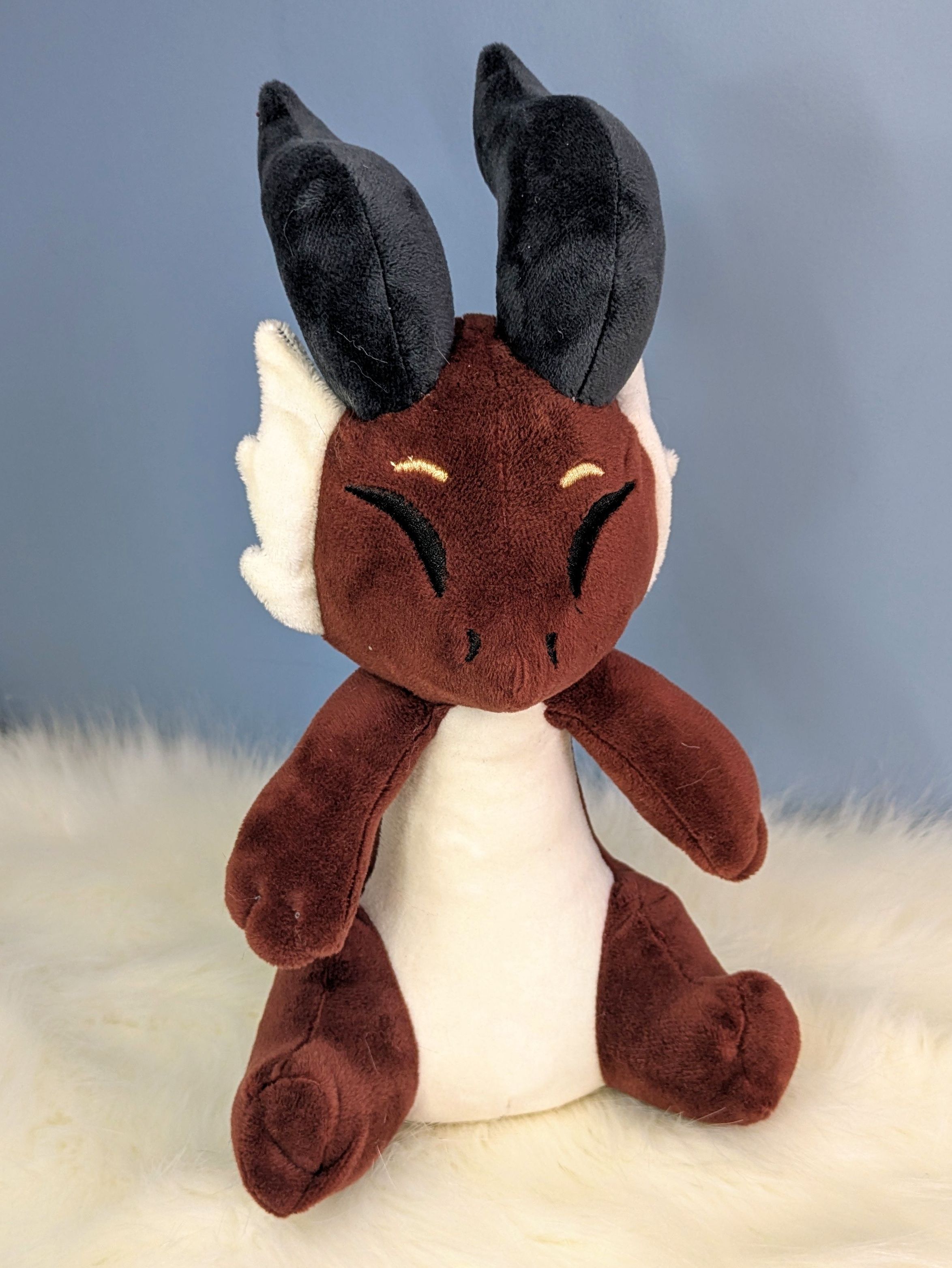 Peluche Dragon assis marron 