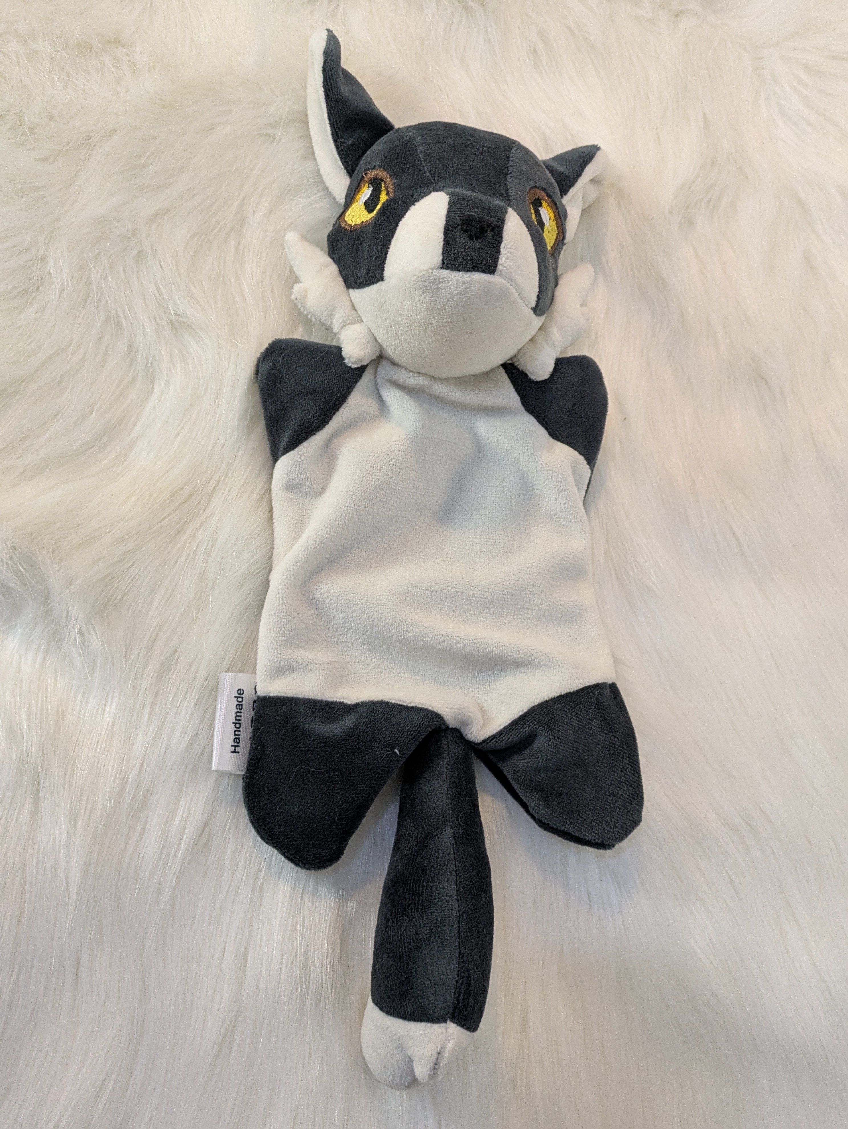 Doudou loup noir et blanc