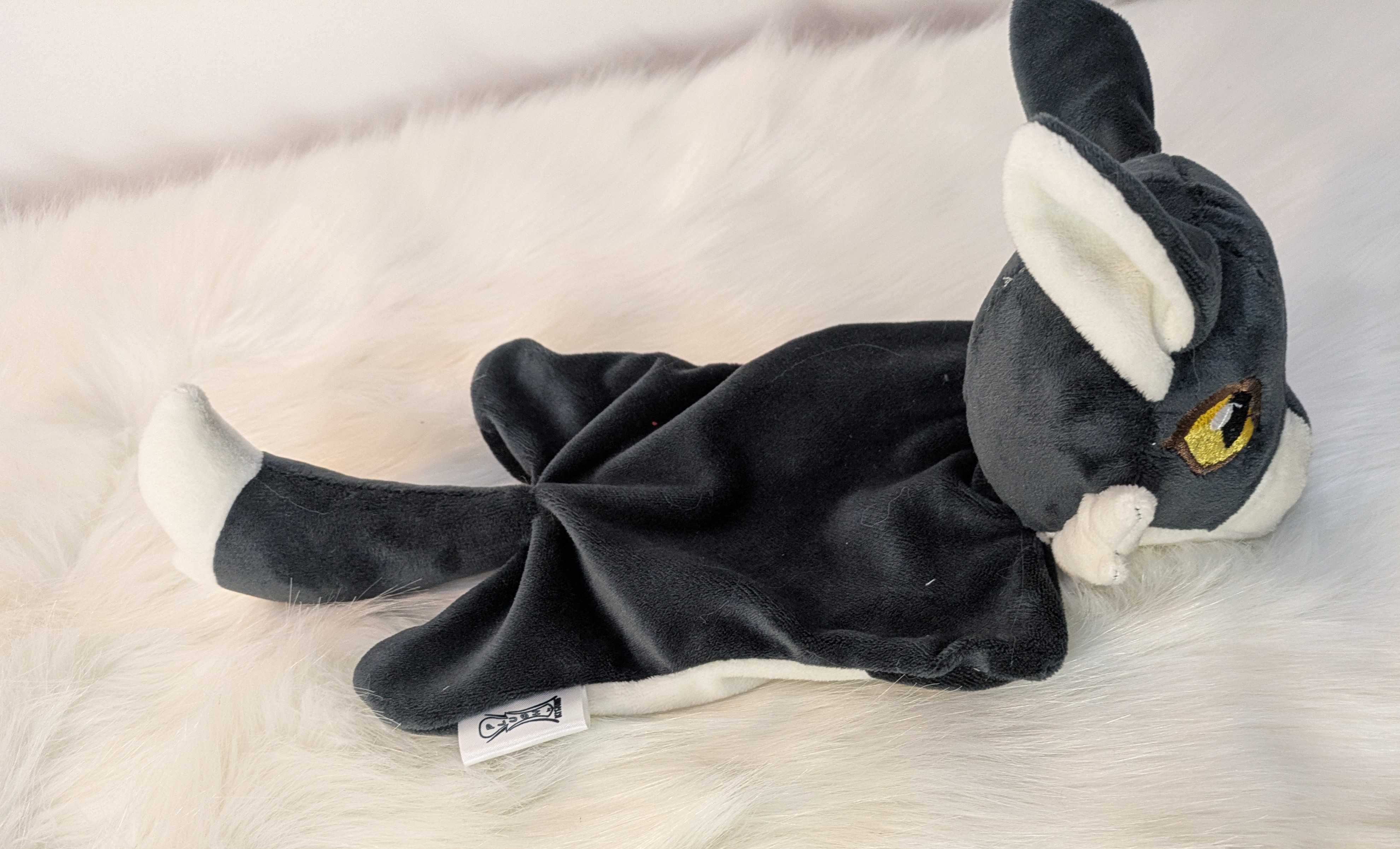 Doudou loup noir et blanc