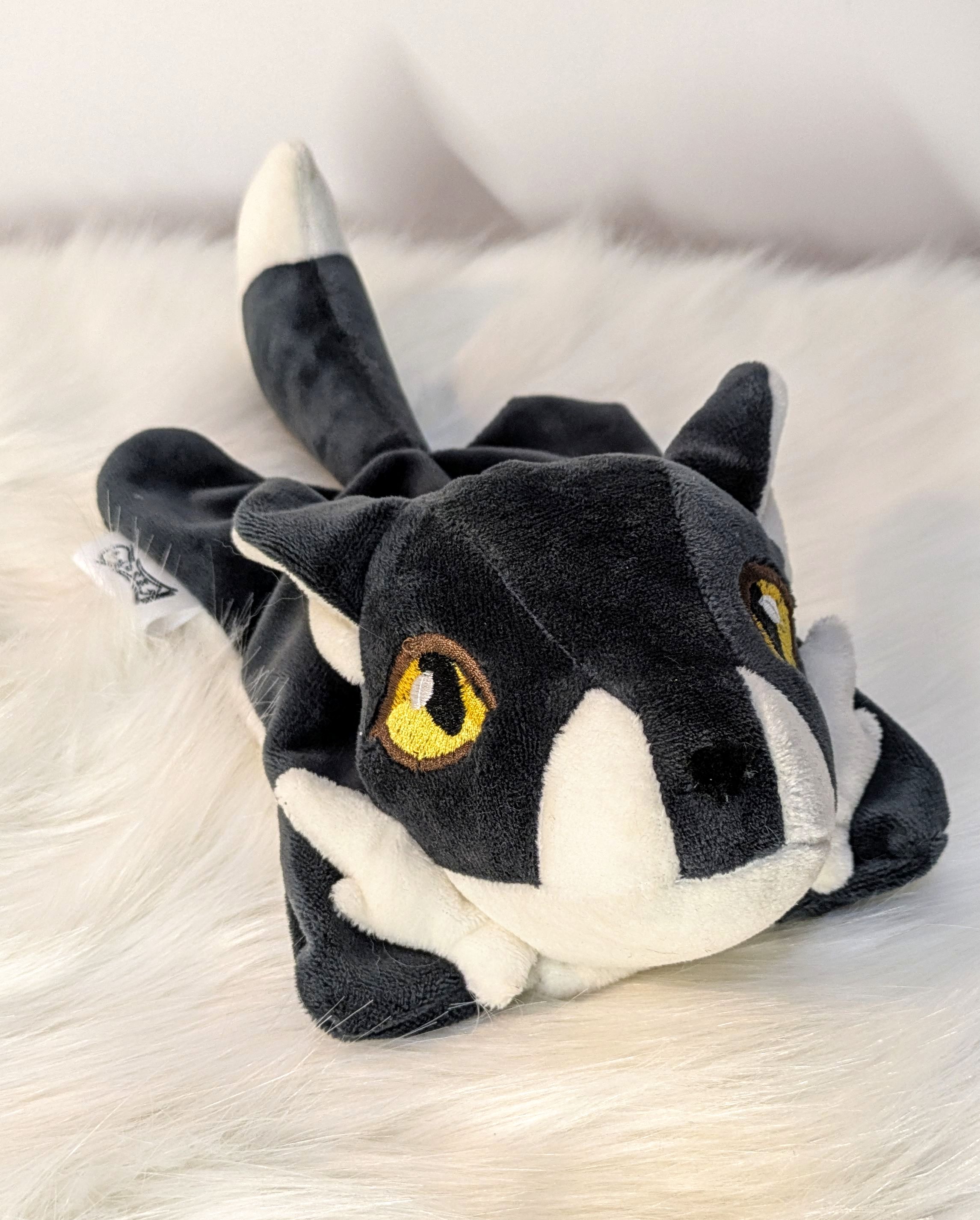 Doudou loup noir et blanc
