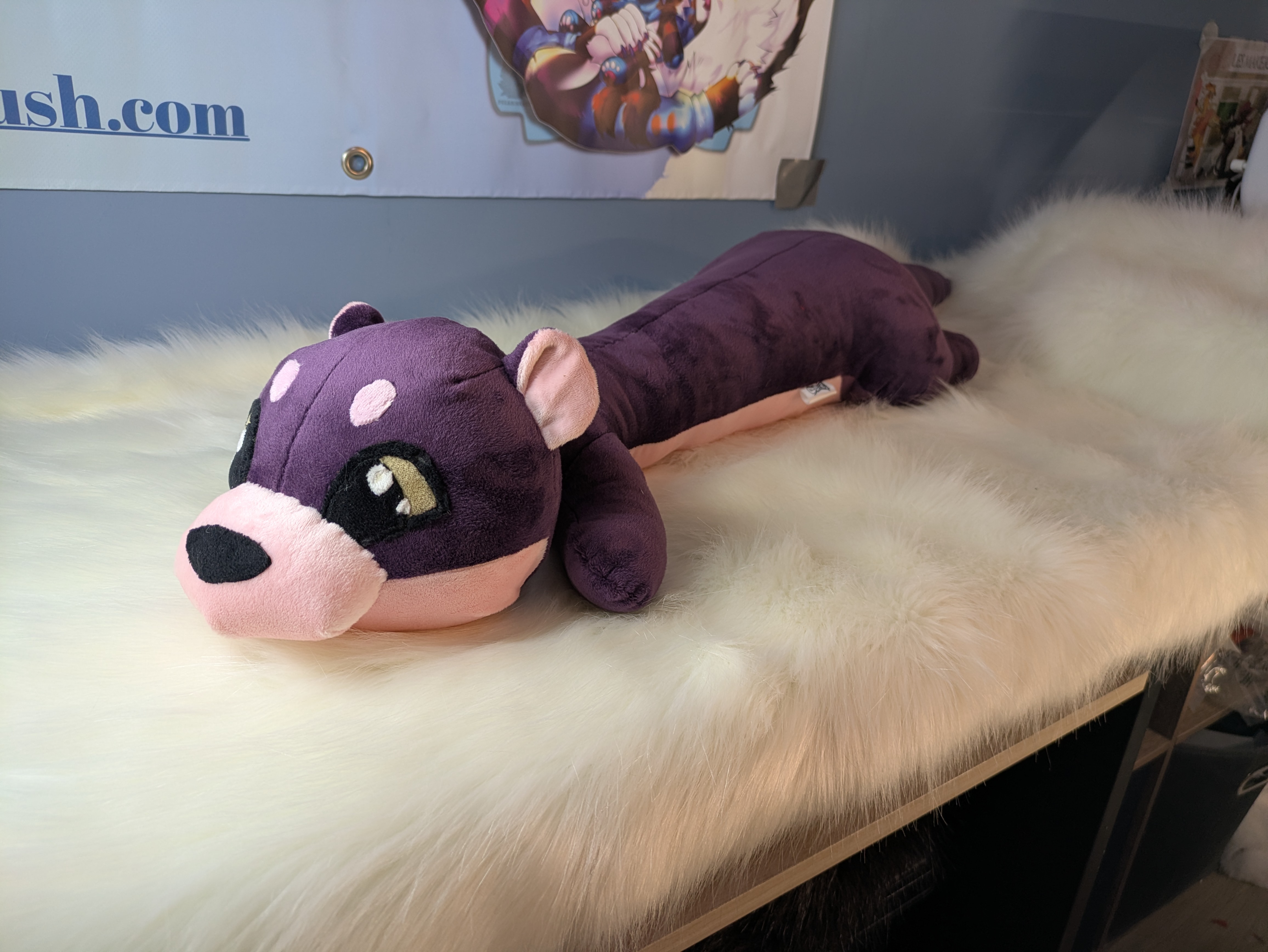 Peluche loutre violette