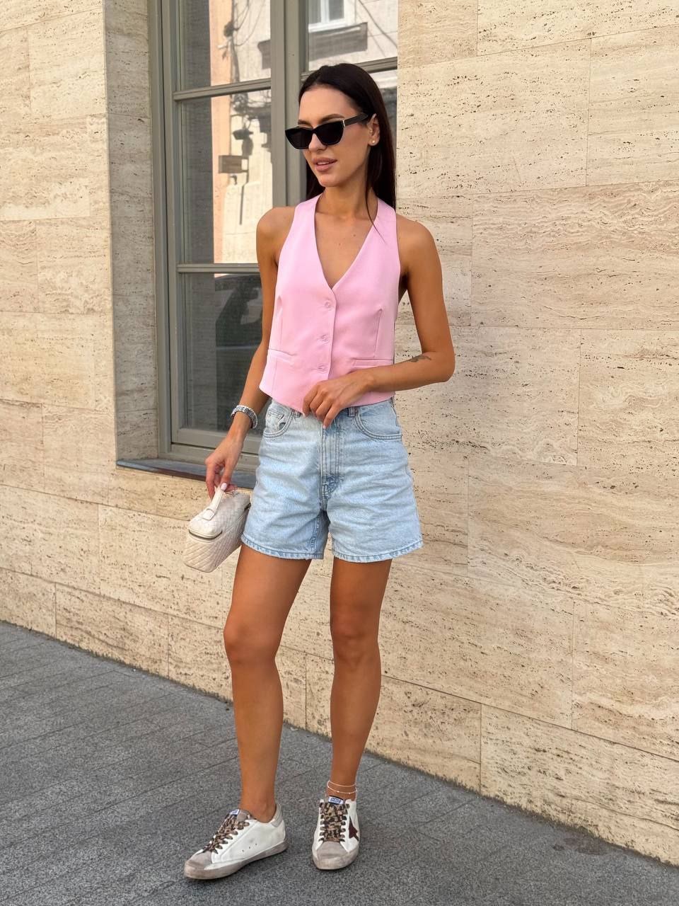 Rožinės spalvos liemenė