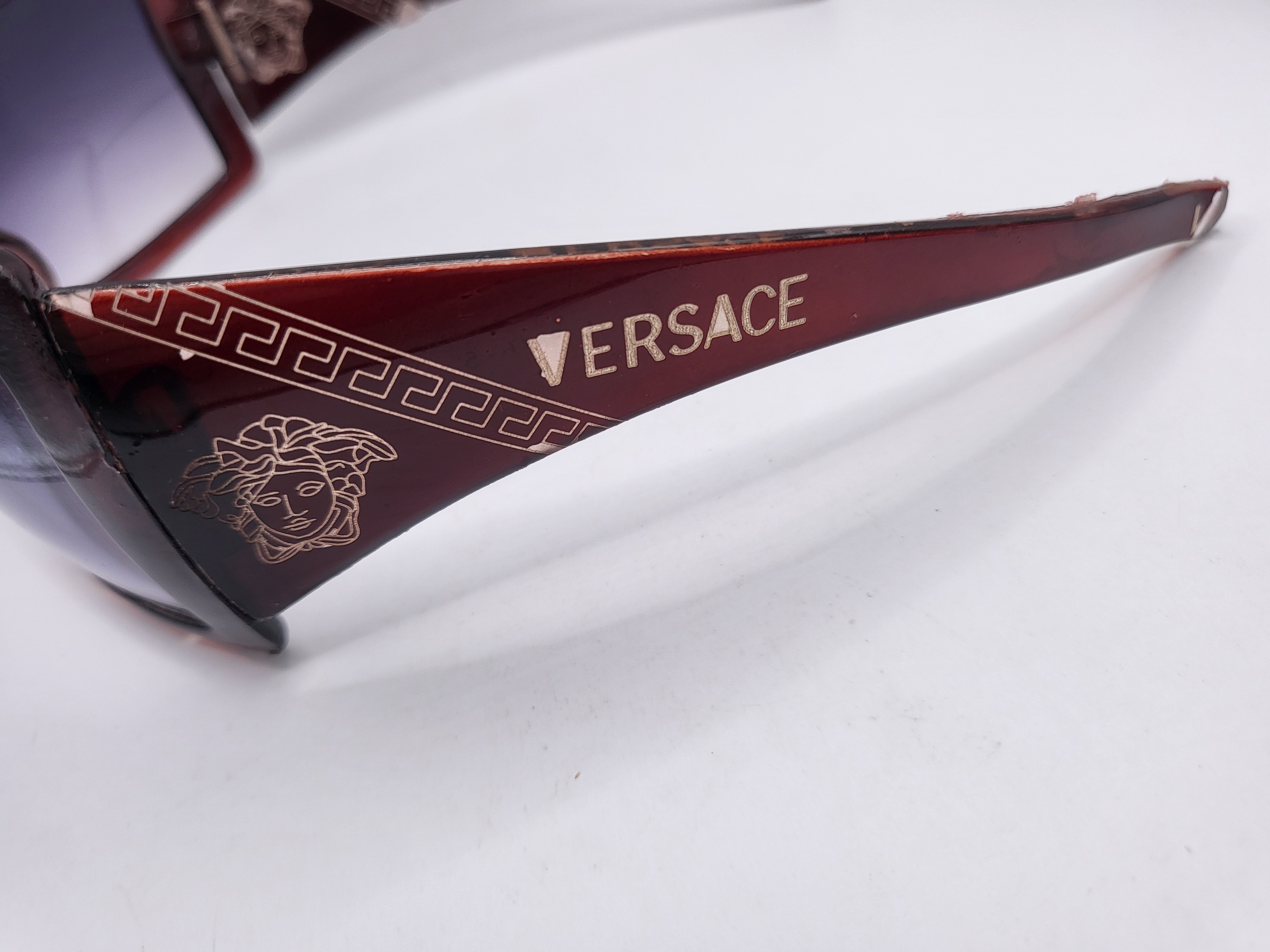 "VERSACE" AKINIAI NUO SAULĖS