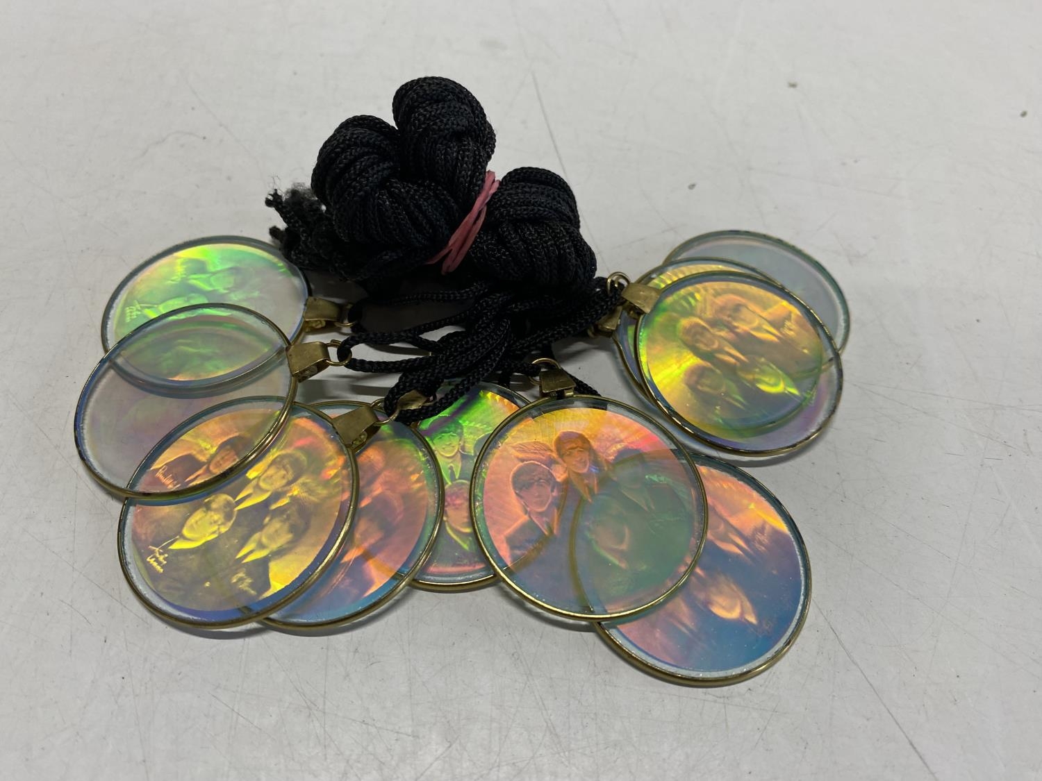 2" Beatles Hologram Pendant on string 