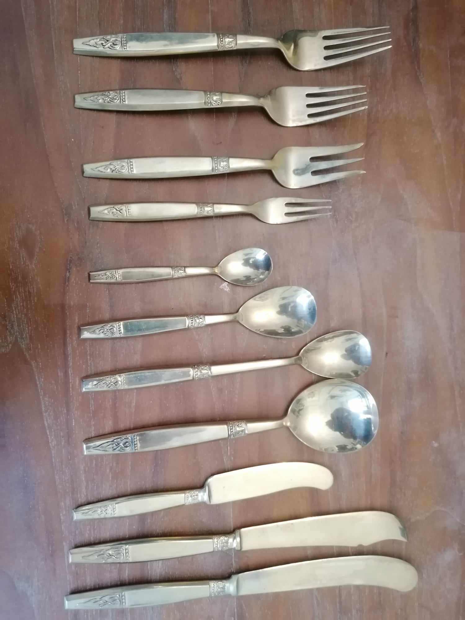 144 piece thai bronze cutlery set recently proffesionaly cleaned and polished