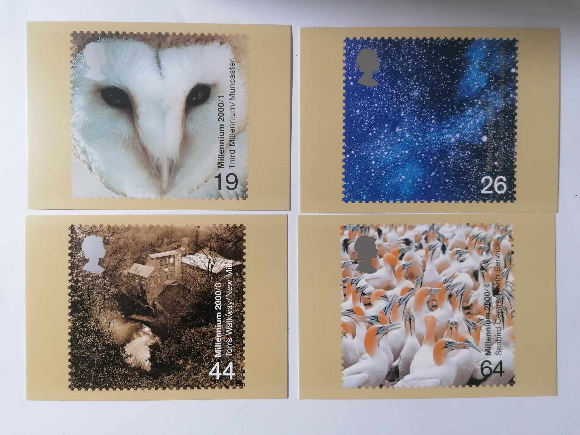 Set of 4 PHQ215 Royal Mail Stamp Postcards Above and Beyond 2000