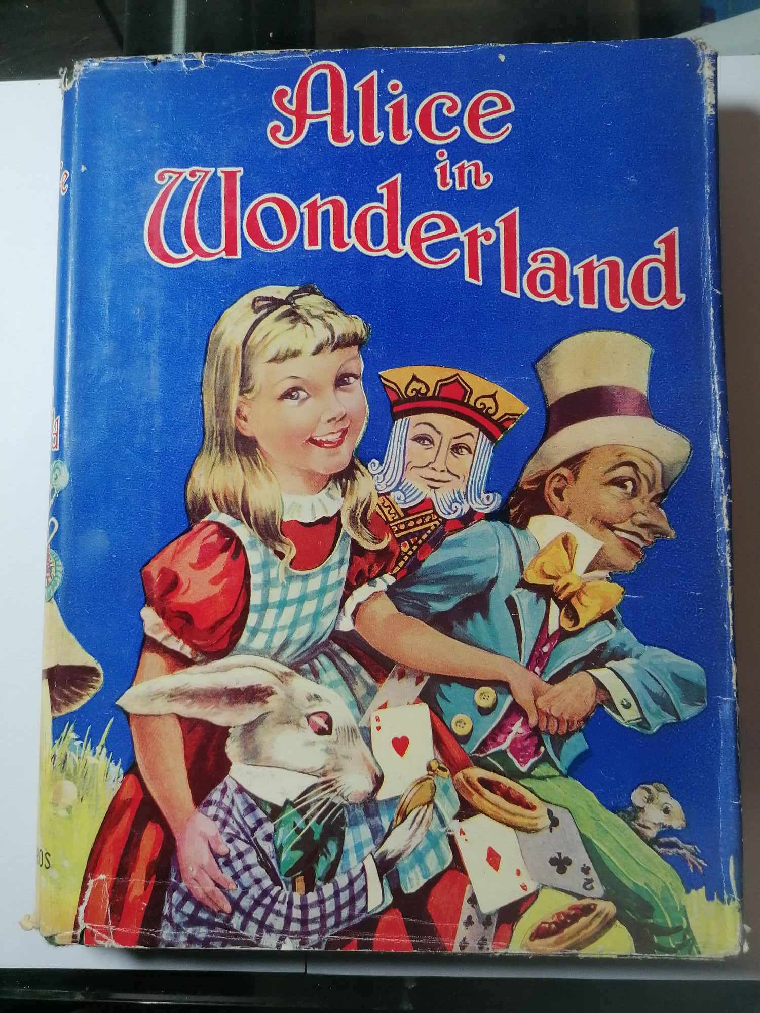 1930's Alice in Wonderland by Lewis Carroll Printed by Birn Brothers Limited with dust cover 