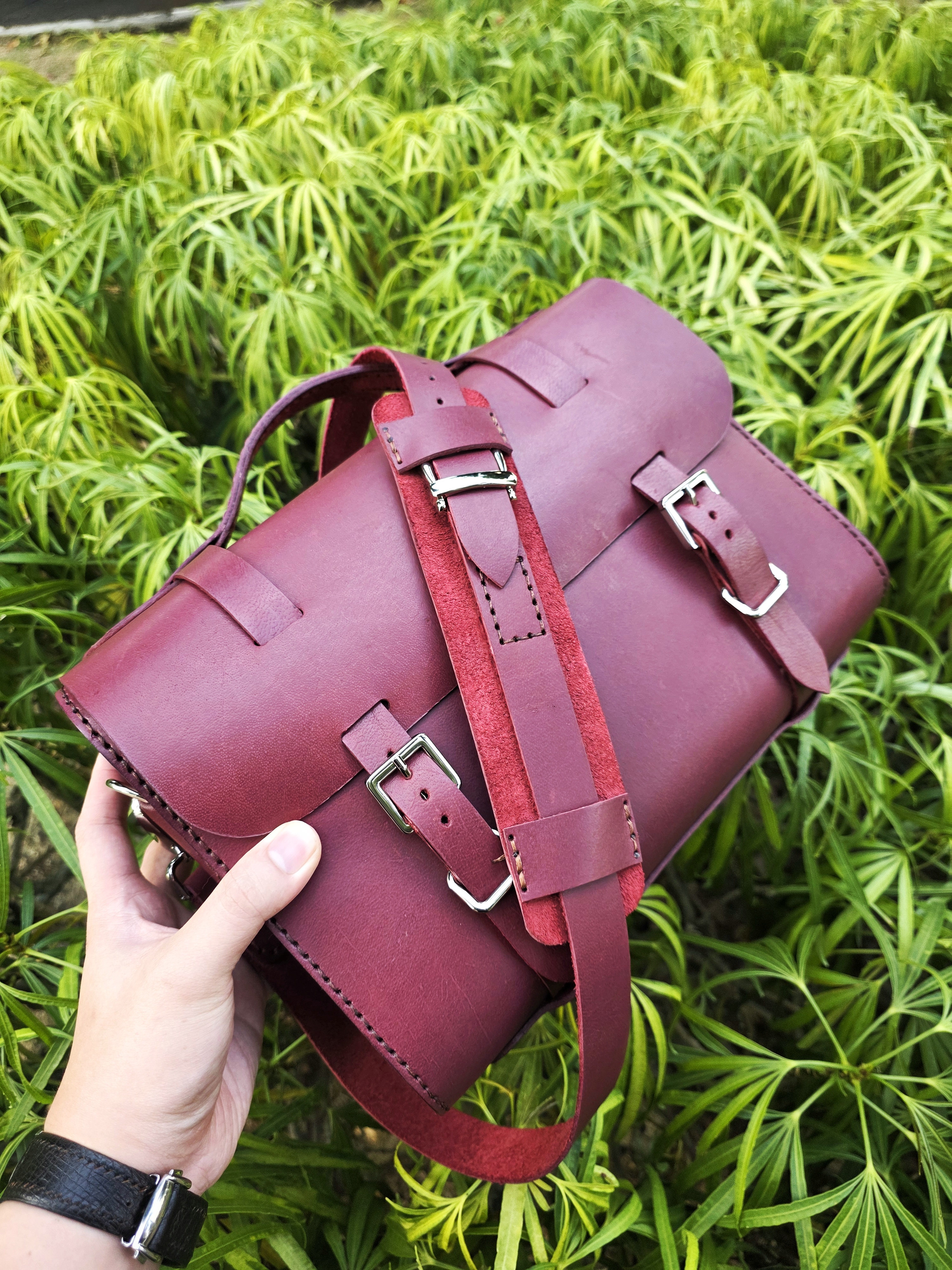 The Andes: A leather messenger sling bag