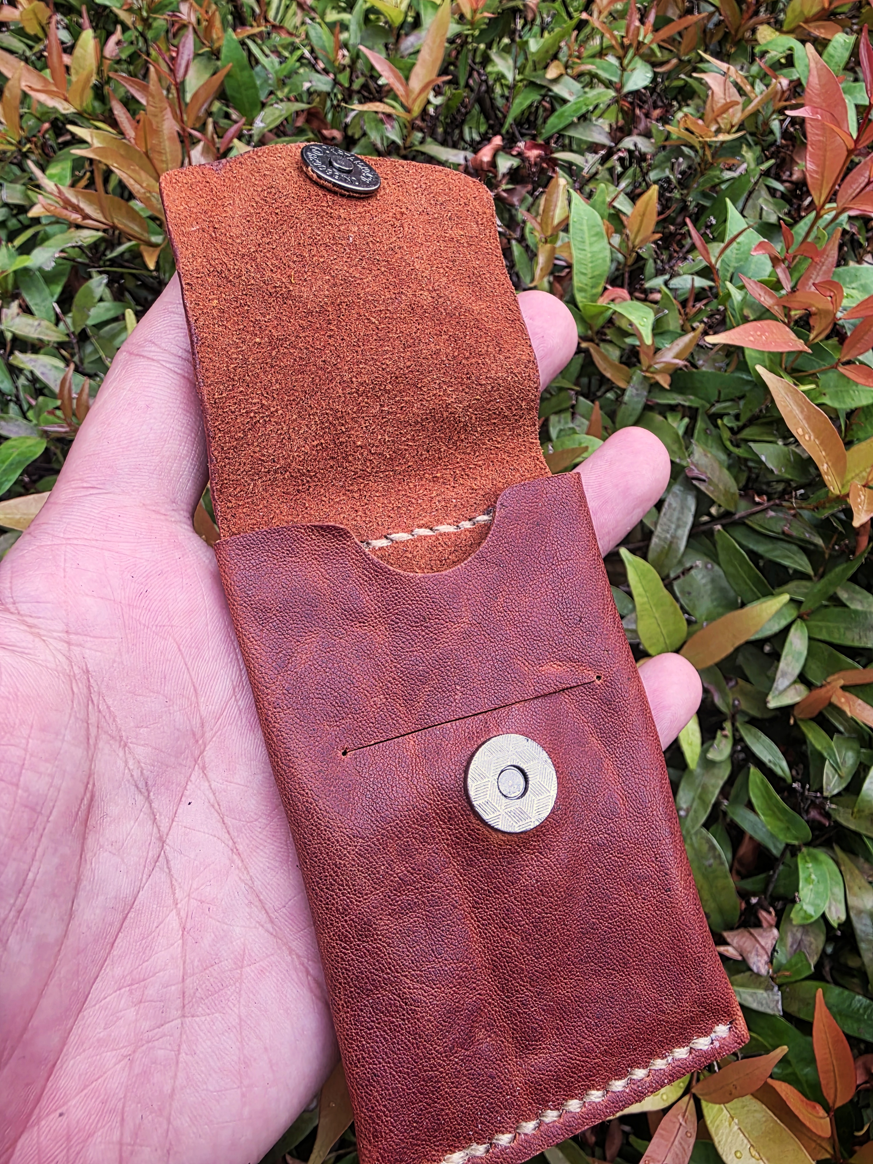 The Parchment V2: a leather clasp card sleeve in brown horse leather